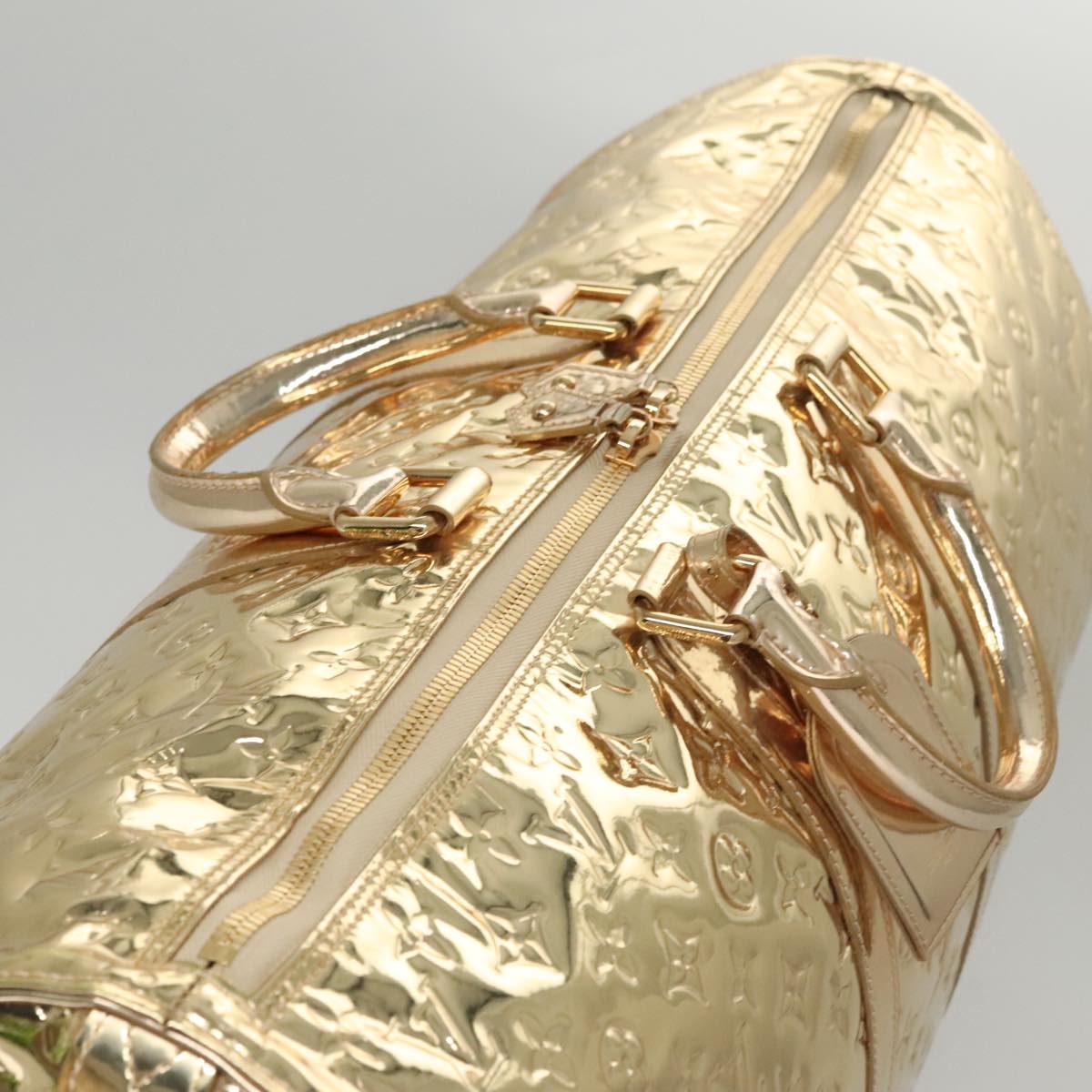 LOUIS VUITTON Monogram Miroir Keepall 55 Boston Bag Gold LV Auth 104239S