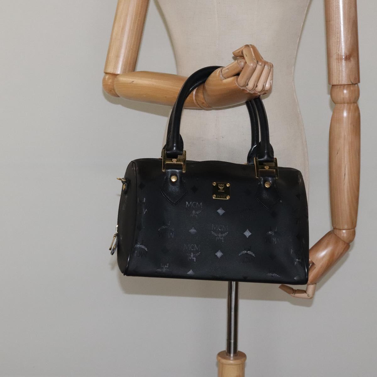 MCM Logogram Vicetos Hand Bag PVC Black Gold Auth 126847
