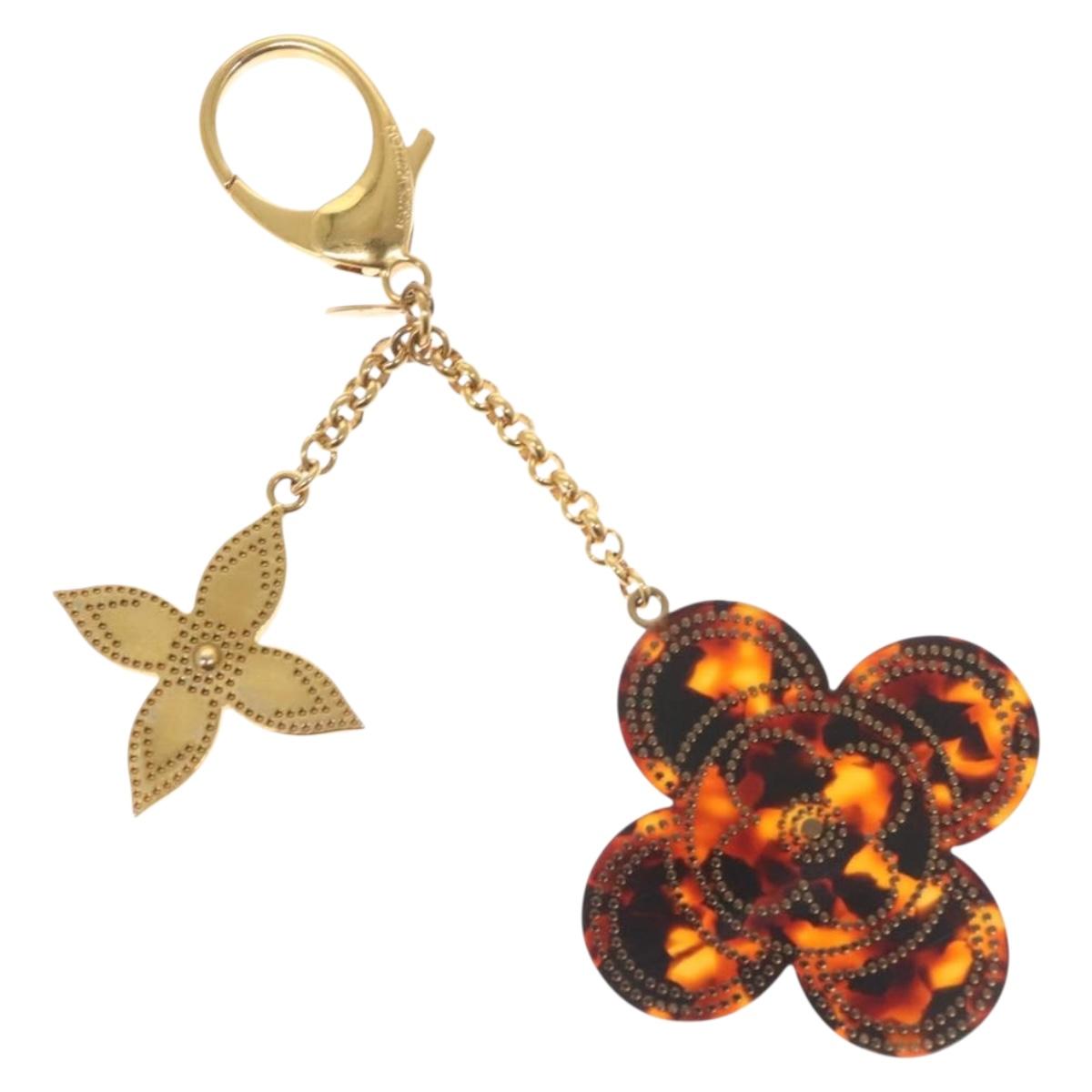 LOUIS VUITTON Stippley Charm metal Brown M66971 LV Auth 130584