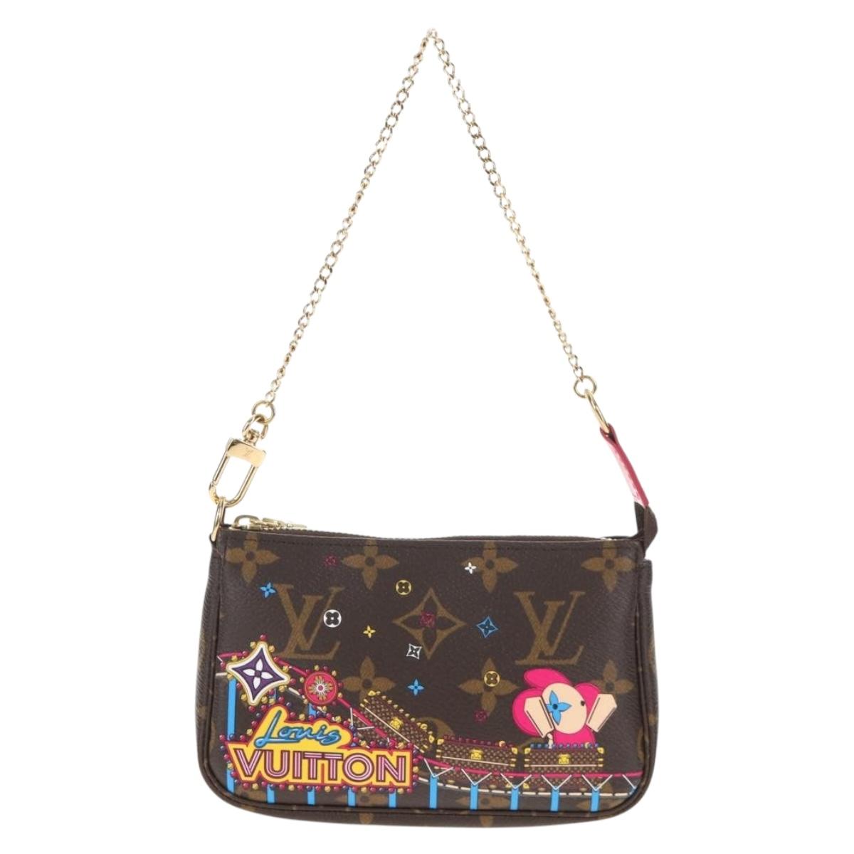 LOUIS VUITTON Monogram Vivienne Mini Pochette Accessoires M69752 LV Auth 137149M