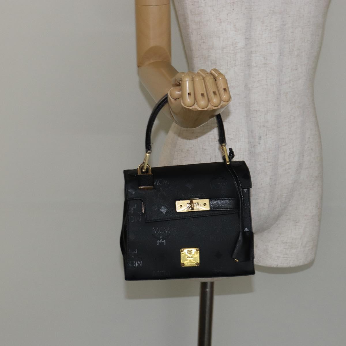 MCM Vicetos Logogram Hand Bag PVC Black Gold Auth 145191