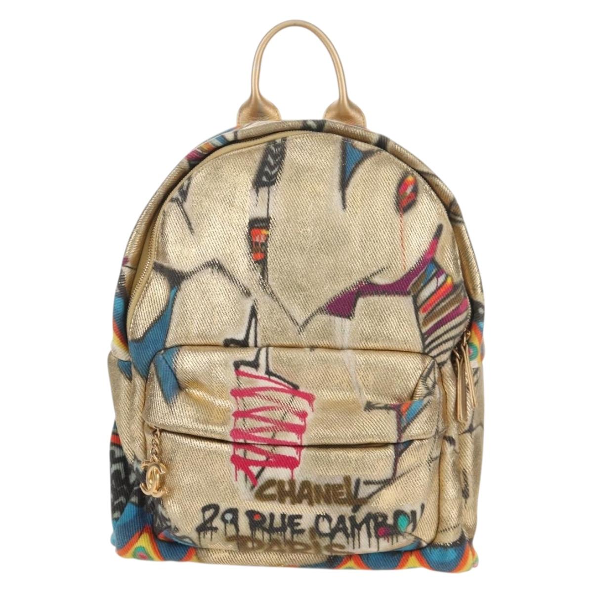 CHANEL Graffiti Backpack Canvas Gold CC Auth 148460SAM