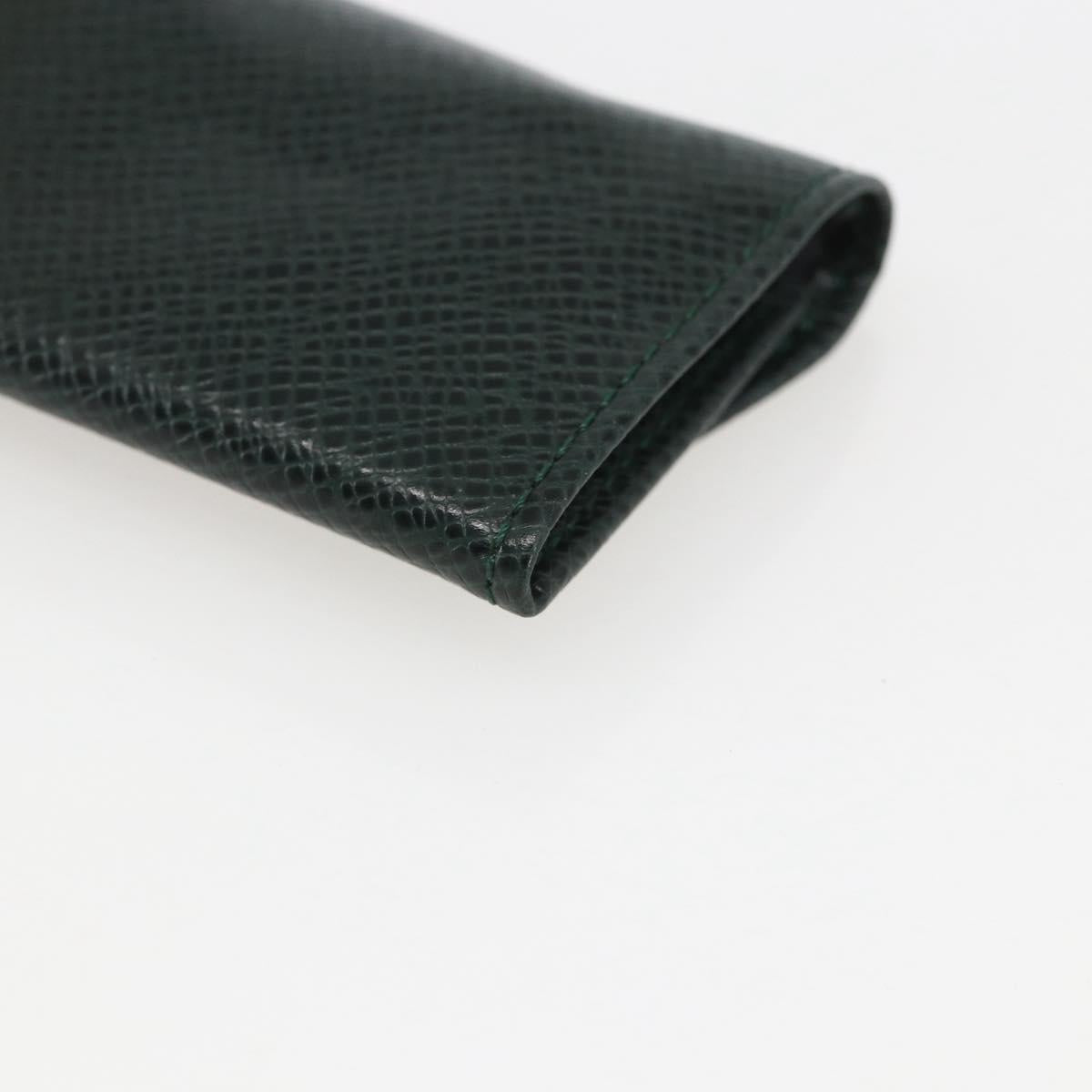 LOUIS VUITTON Taiga Buton De Manchette Cuffs metal Gold Tone LV Auth 156221