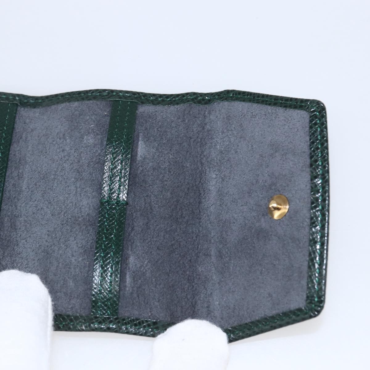 LOUIS VUITTON Taiga Buton De Manchette Cuffs metal Gold Tone LV Auth 156221