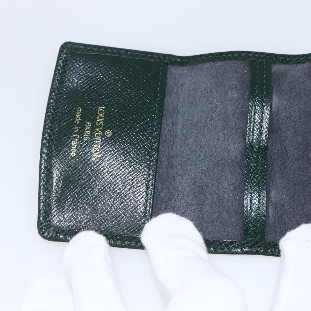 LOUIS VUITTON Taiga Buton De Manchette Cuffs metal Gold Tone LV Auth 156221