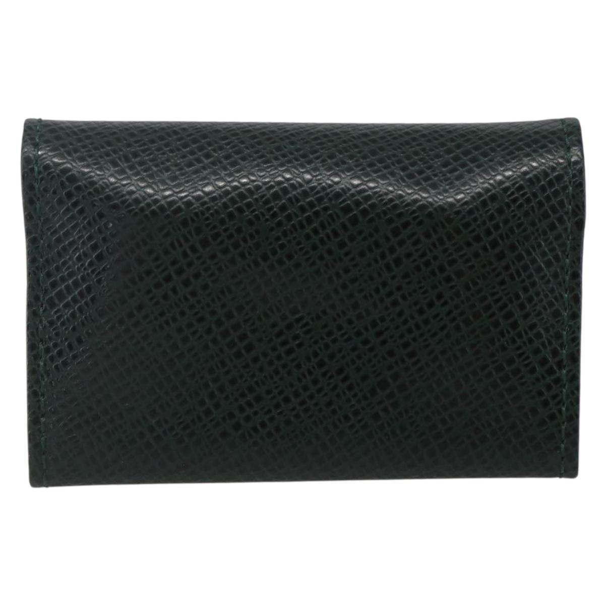 LOUIS VUITTON Taiga Buton De Manchette Cuffs metal Gold Tone LV Auth 156221