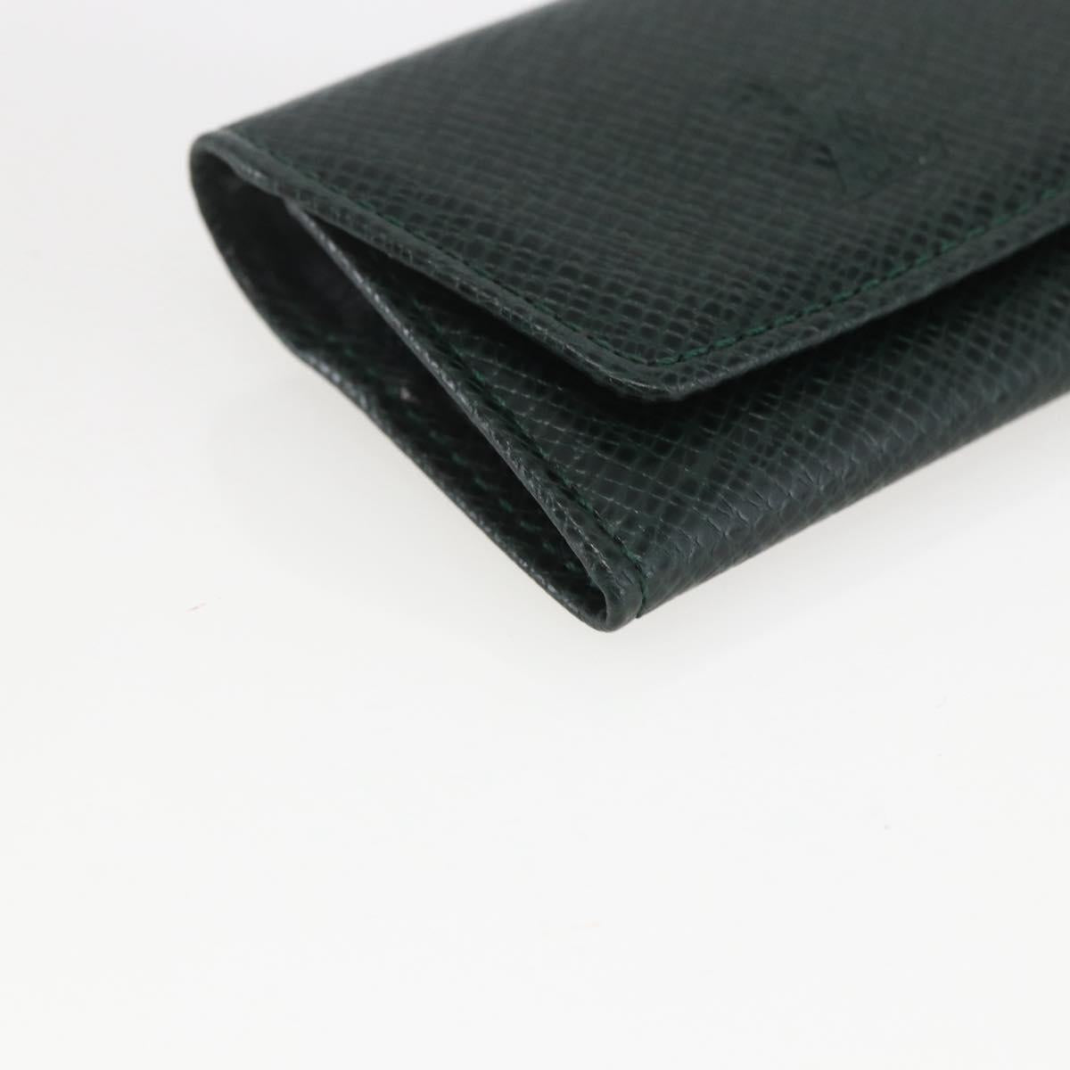 LOUIS VUITTON Taiga Buton De Manchette Cuffs metal Gold Tone LV Auth 156221