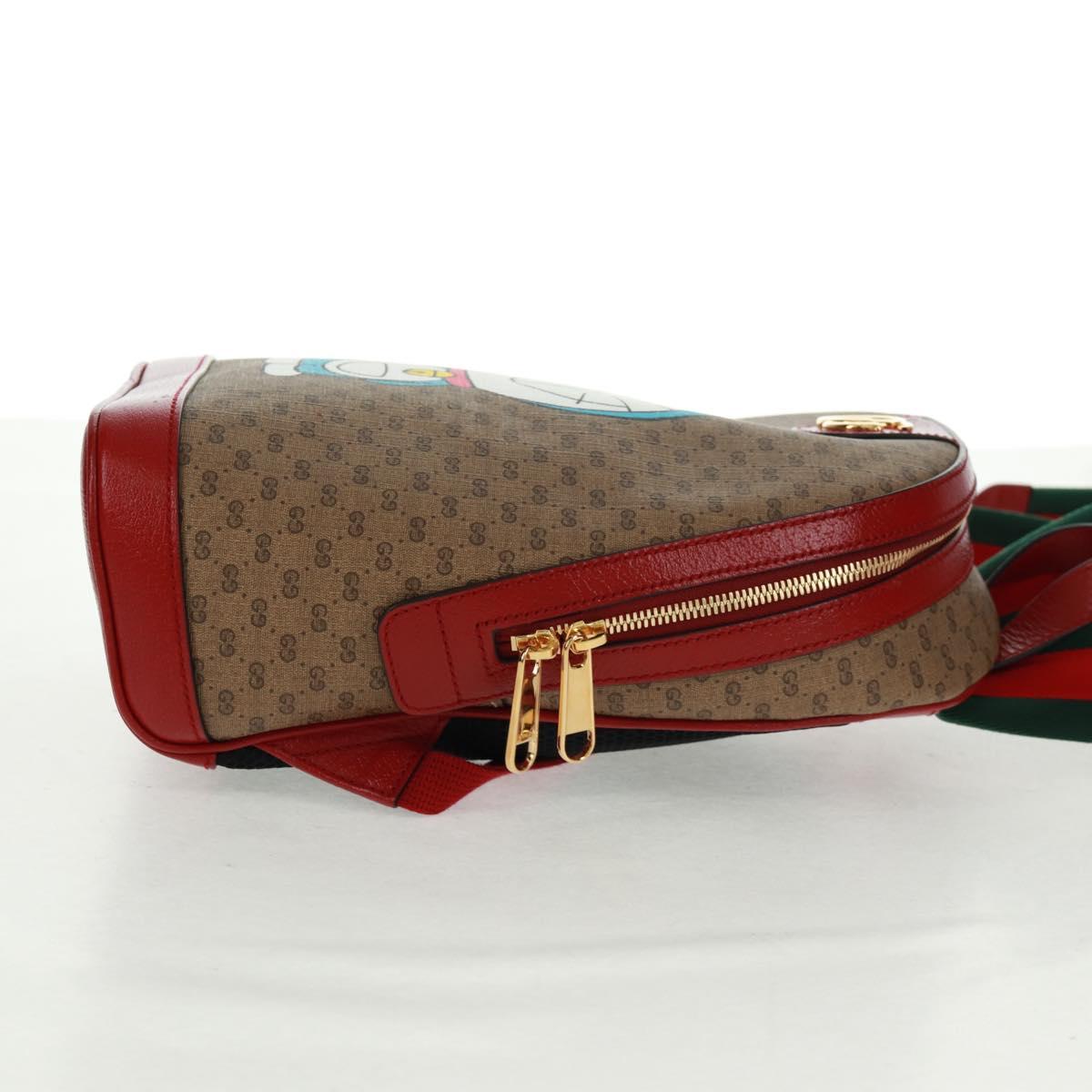 GUCCI Micro GG Supreme Doraemon Backpack PVC Beige Gold 647816 Auth 165616SAM