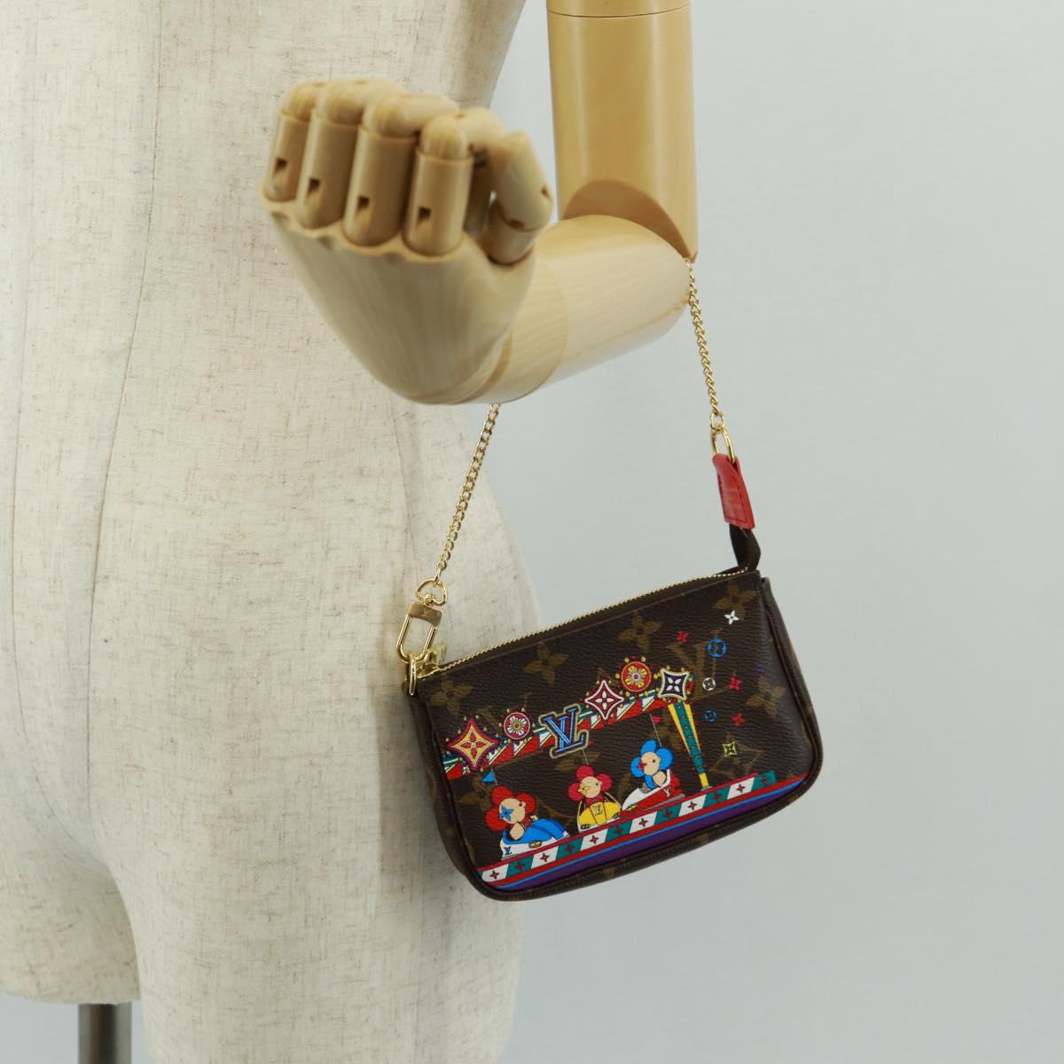 LOUIS VUITTON Monogram Vivienne Mini Pochette Accessoires M69976 LV Auth 166052SAM