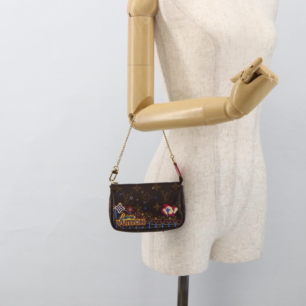 LOUIS VUITTON Monogram Vivienne Mini Pochette Accessoires M81637 Auth 167034SM