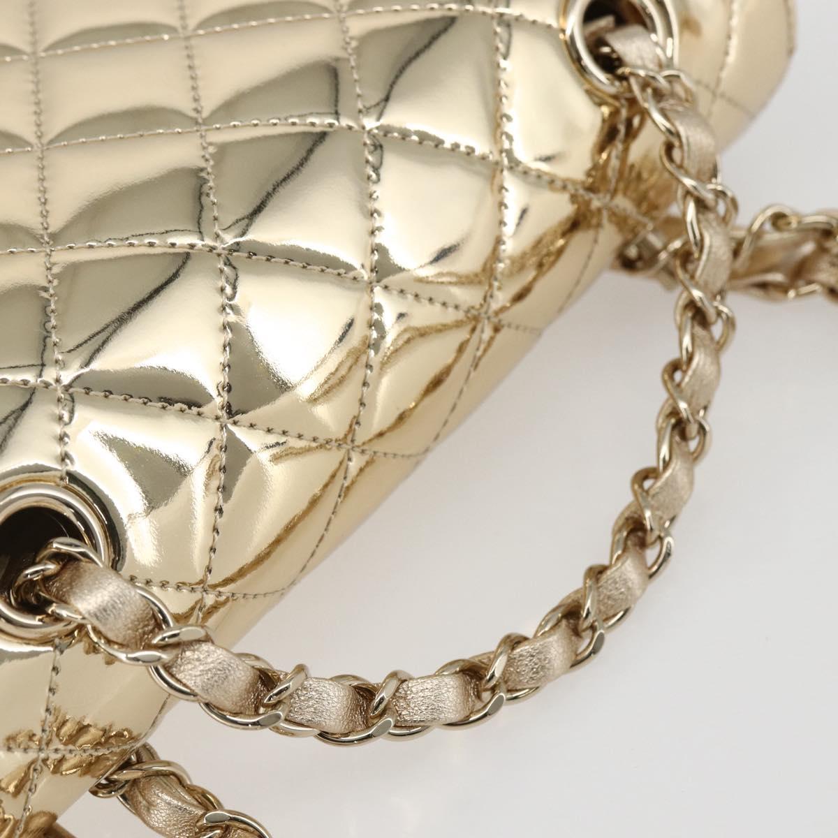 CHANEL Matelasse Backpack Patent leather Gold CC Auth 169659SM