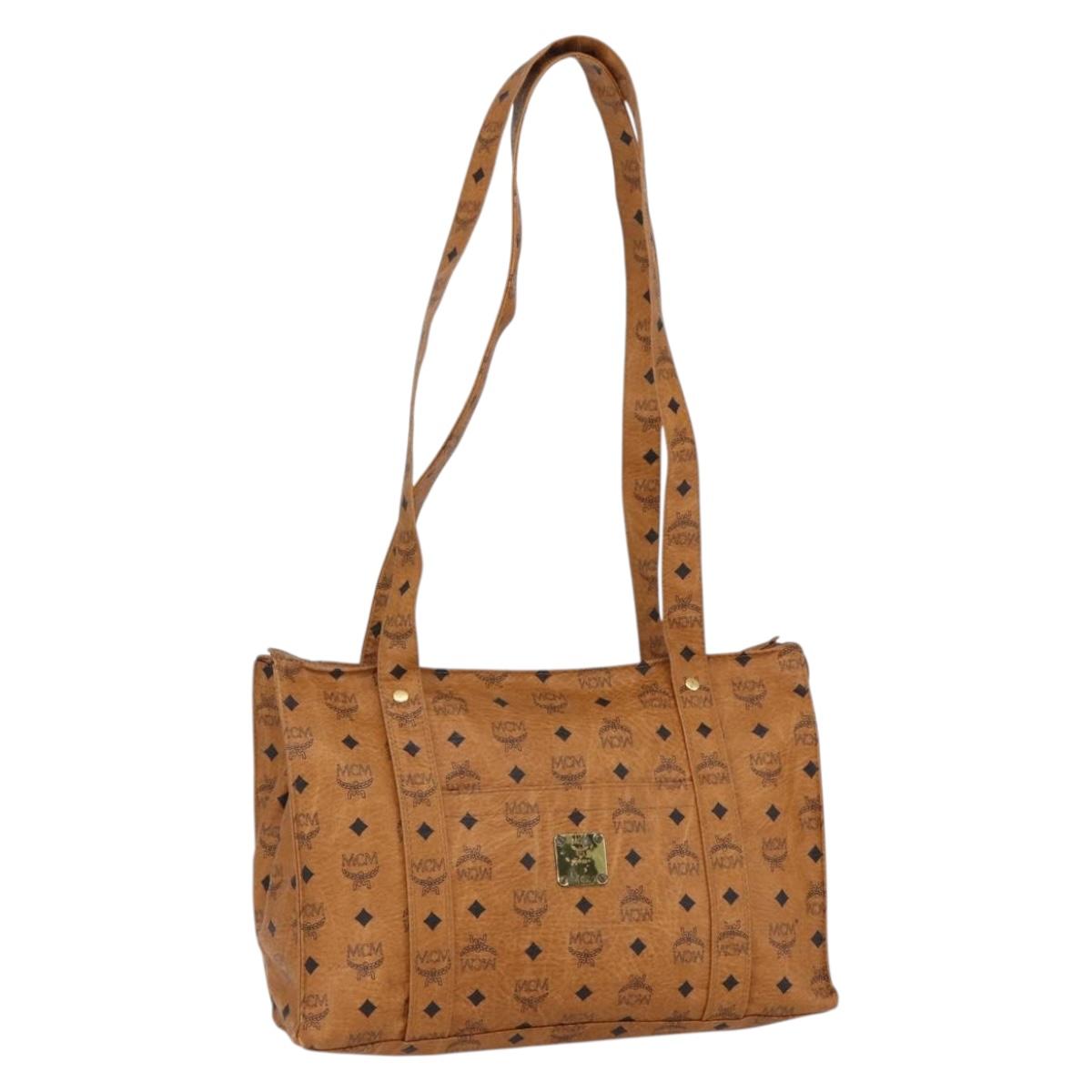 MCM Logogram Vicetos Tote Bag PVC Brown Gold Auth 170393