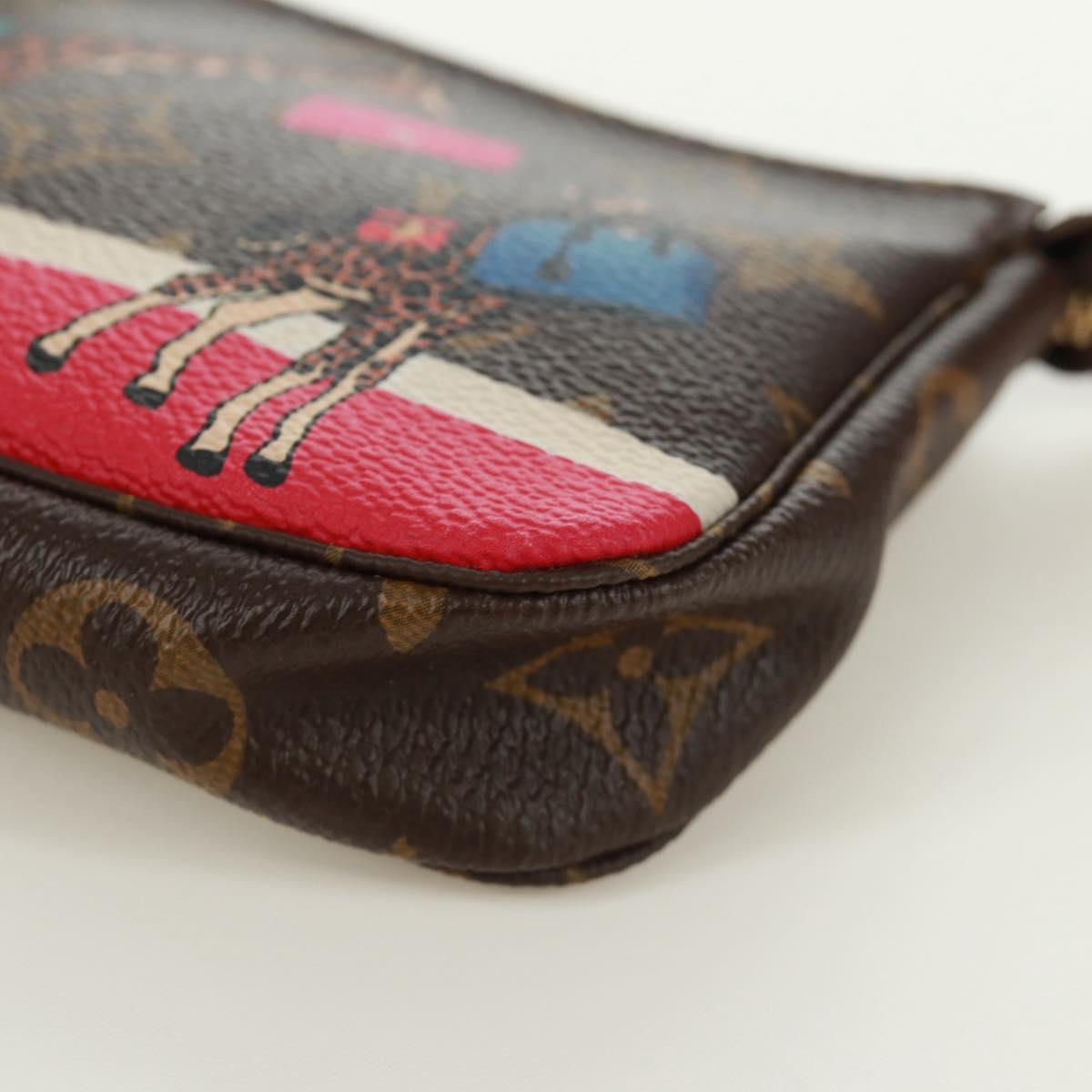 LOUIS VUITTON Monogram Giraffe Mini Pochette Accessoires M62087 LV Auth 172028M