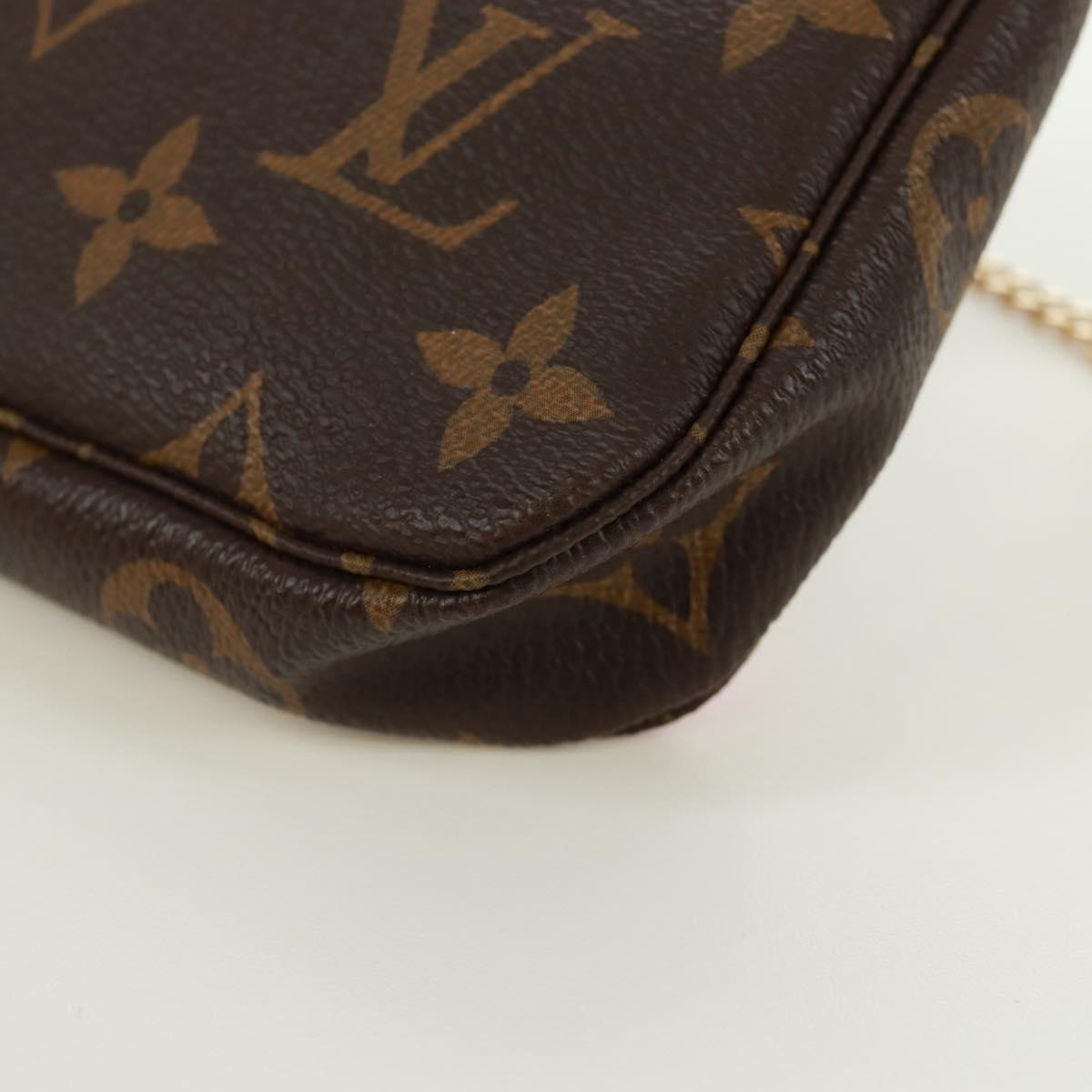 LOUIS VUITTON Monogram Giraffe Mini Pochette Accessoires M62087 LV Auth 172028M