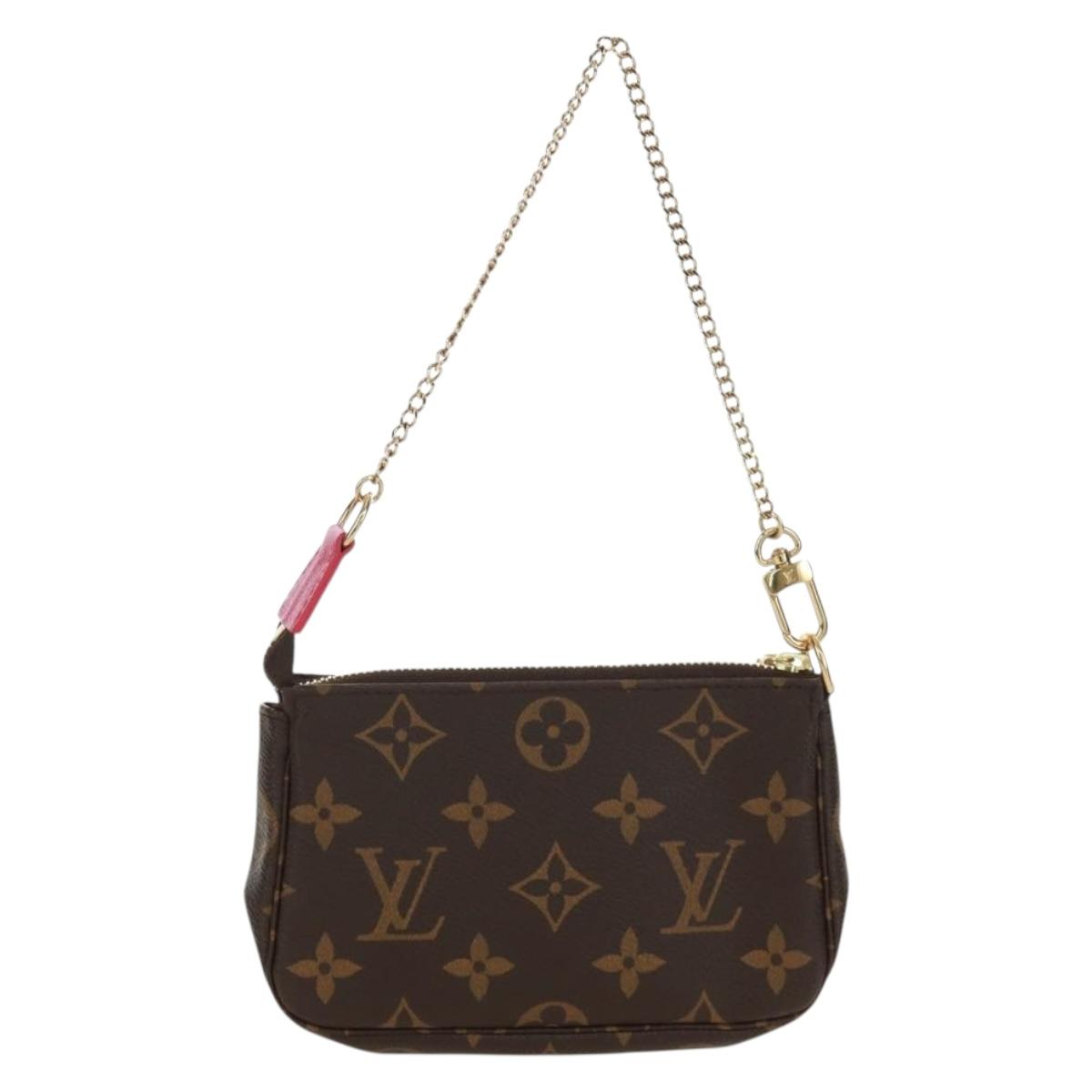 LOUIS VUITTON Monogram Giraffe Mini Pochette Accessoires M62087 LV Auth 172028M