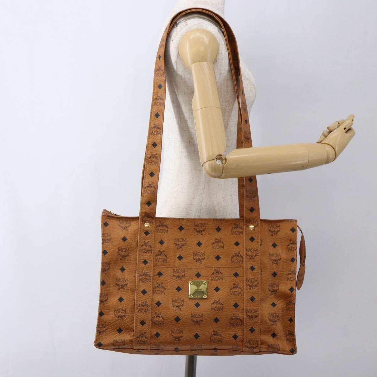 MCM Logogram Vicetos Tote Bag PVC Brown Gold Auth 172274