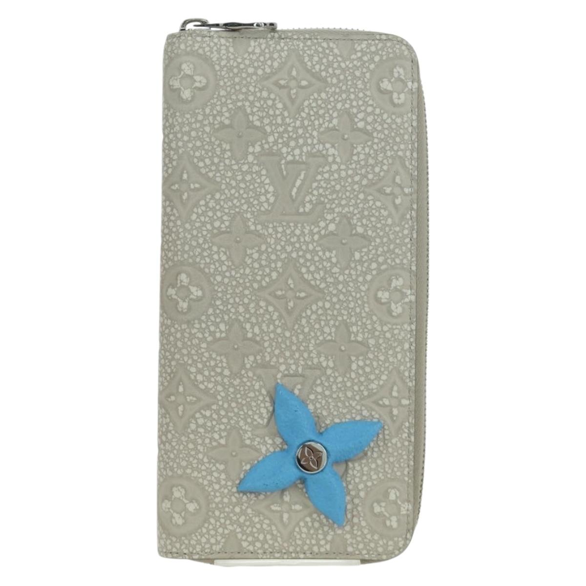 LOUIS VUITTON Taurillon Climbing Zippy Wallet Vertical Ivory M81573 Auth 172432SAM