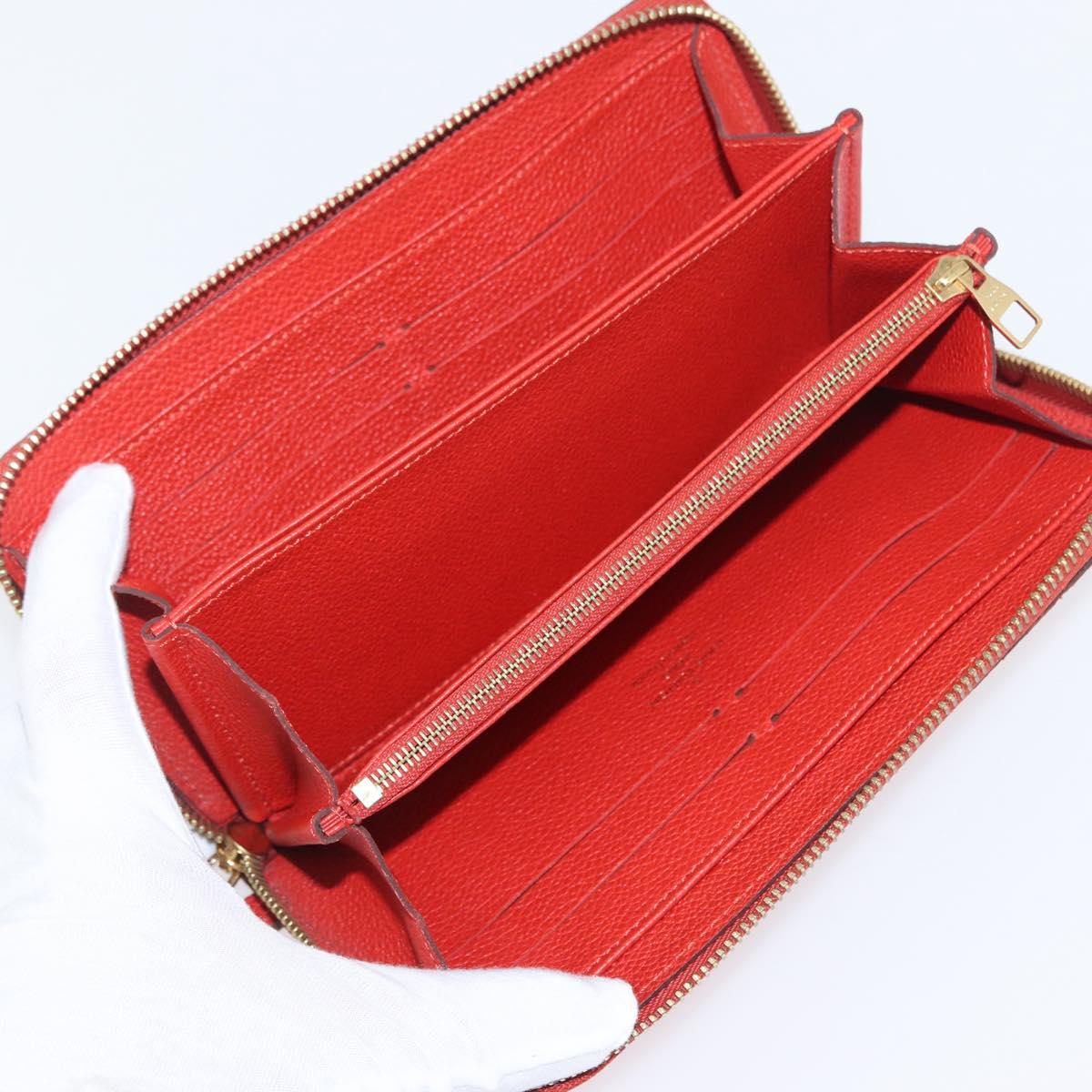 LOUIS VUITTON Monogram Empreinte Zippy Long Wallet Orange M60775 LV Auth 173020V