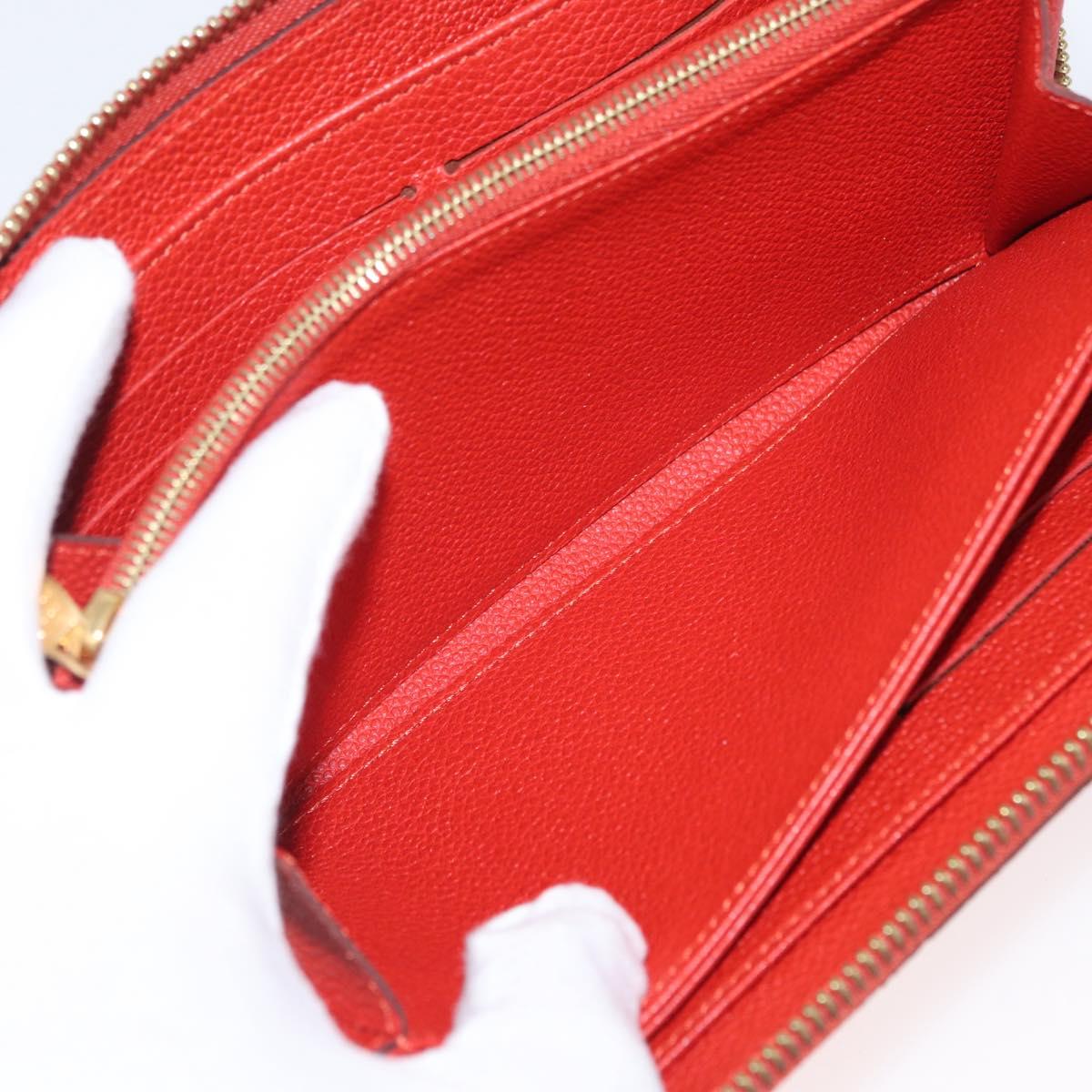 LOUIS VUITTON Monogram Empreinte Zippy Long Wallet Orange M60775 LV Auth 173020V