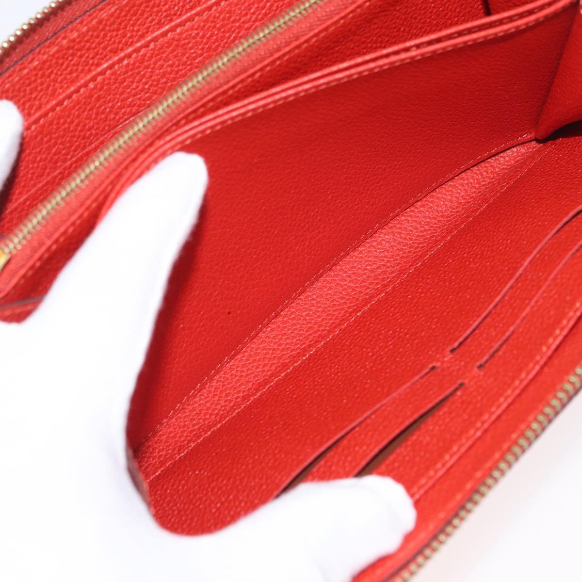 LOUIS VUITTON Monogram Empreinte Zippy Long Wallet Orange M60775 LV Auth 173020V