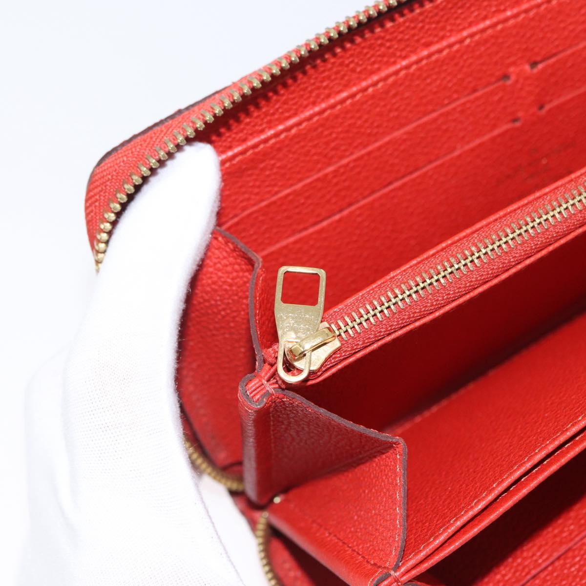 LOUIS VUITTON Monogram Empreinte Zippy Long Wallet Orange M60775 LV Auth 173020V