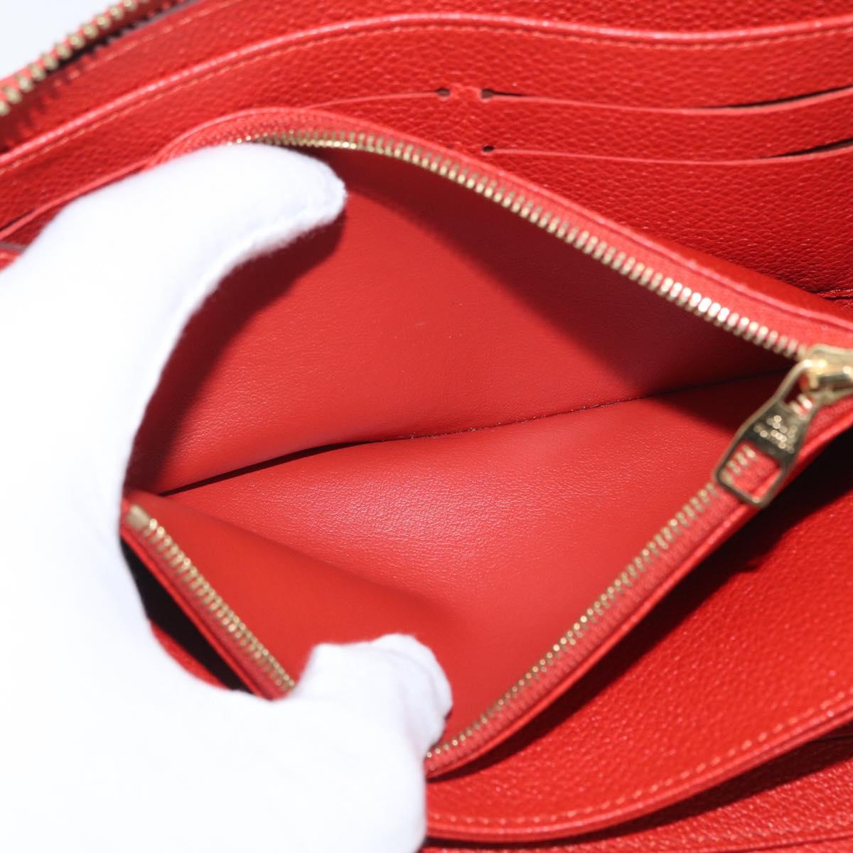 LOUIS VUITTON Monogram Empreinte Zippy Long Wallet Orange M60775 LV Auth 173020V