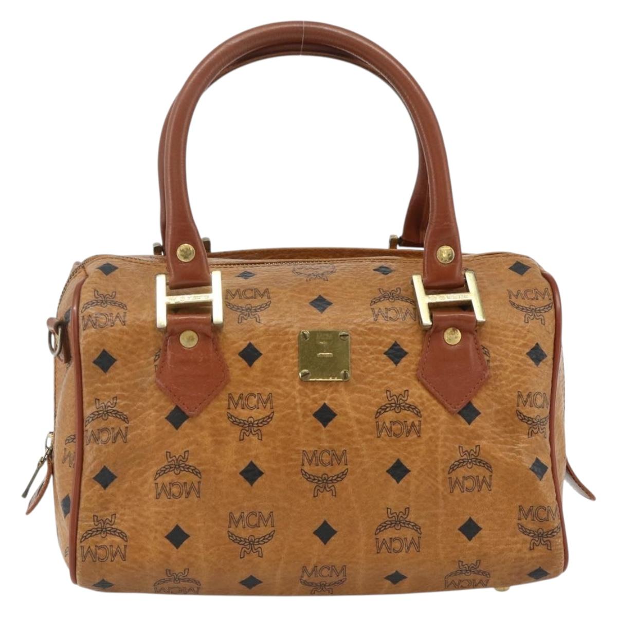 MCM Logogram Vicetos Boston Bag PVC Brown Gold Auth 178073A