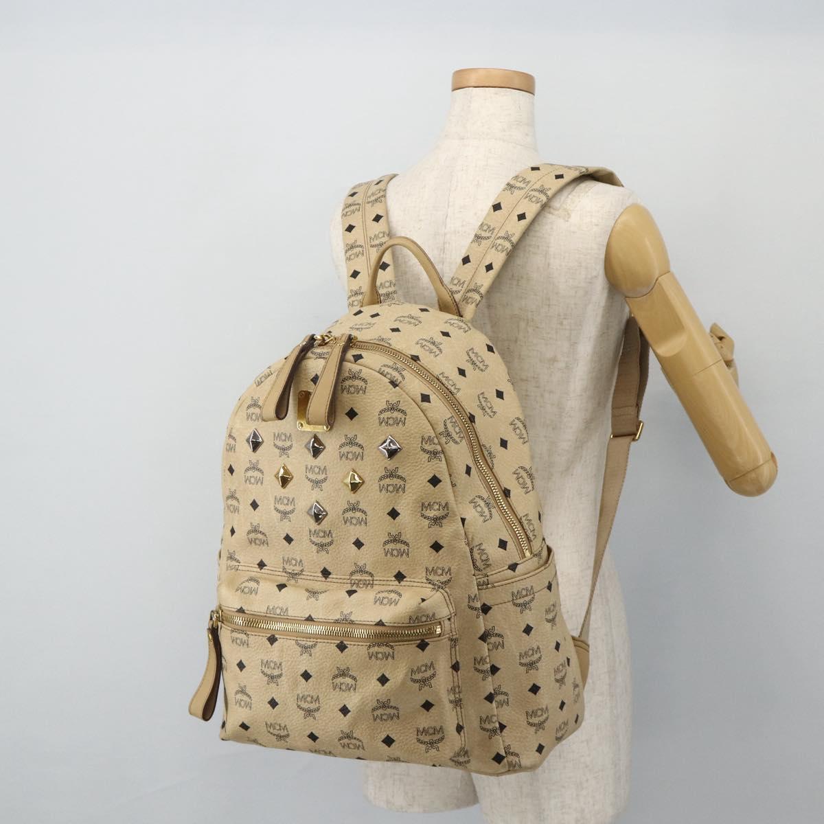 MCM Vicetos Logogram Backpack PVC Beige Gold Auth 179430