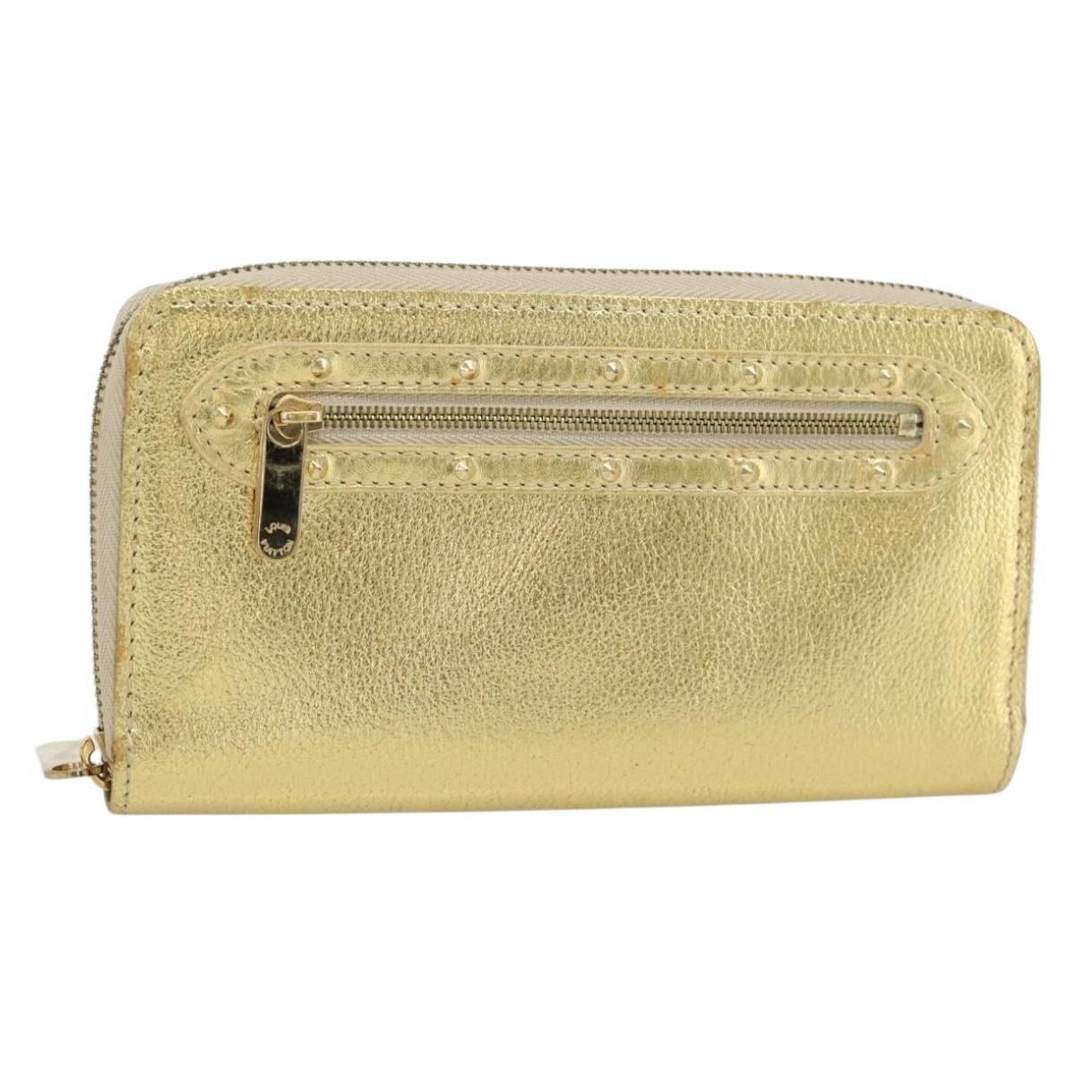 LOUIS VUITTON Zippy Wallet Long Wallet Suhari Gold M95569 LV Auth 182314A