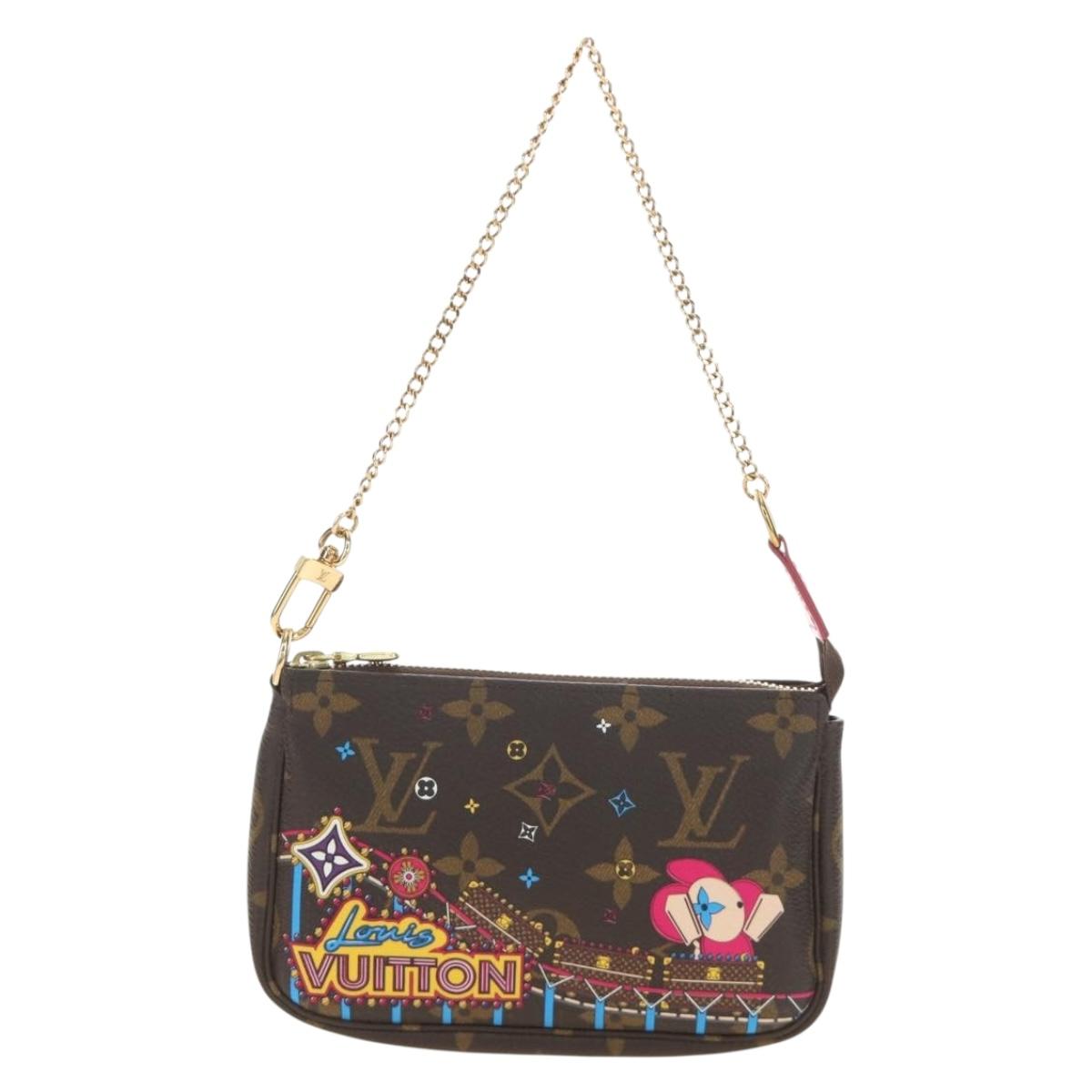 LOUIS VUITTON Monogram Vivienne Mini Pochette Accessoires M69752 Auth 184588SAM