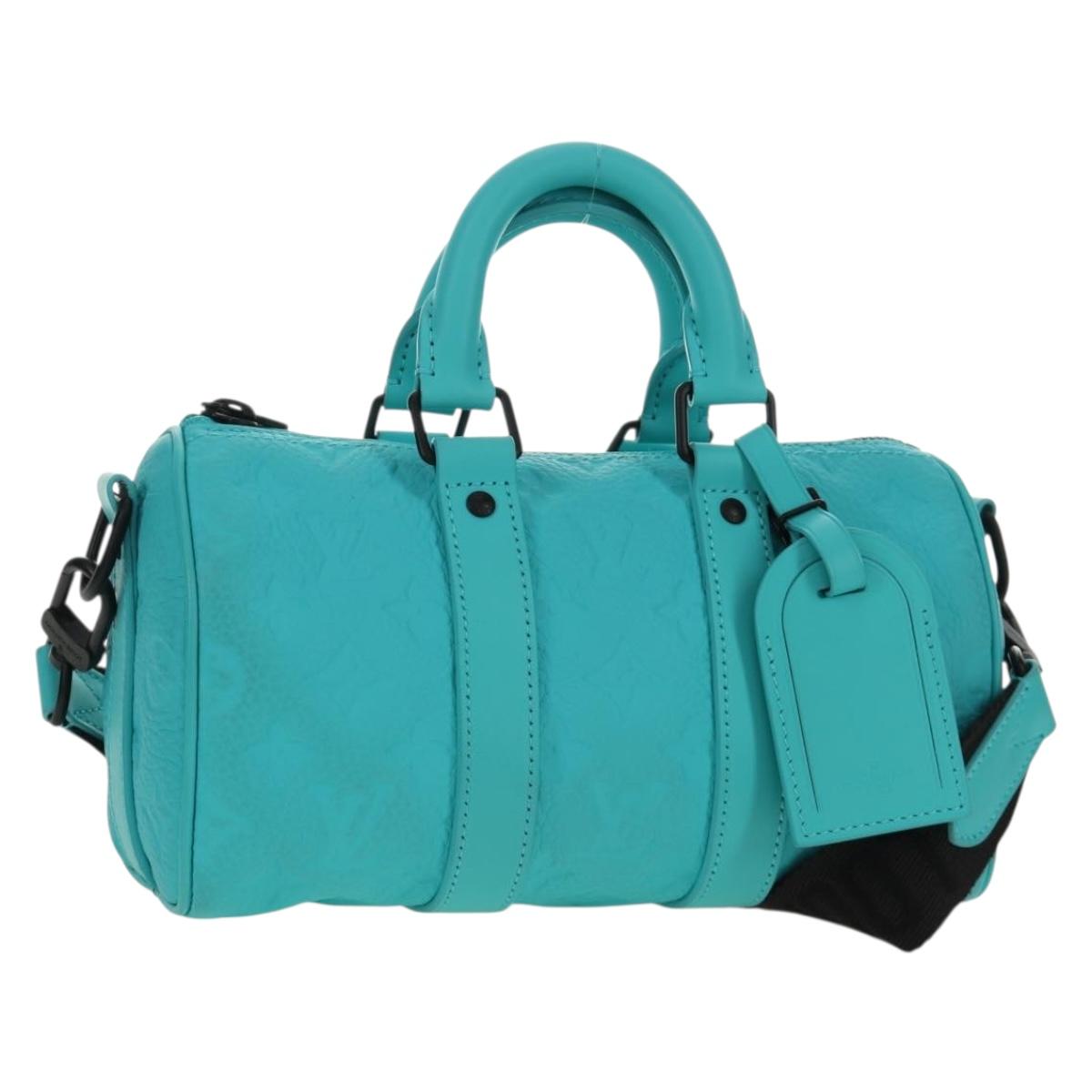 LOUIS VUITTON Taurillon Clemence Keepall Bandouliere 25 Bag M11996 Auth 185940SM