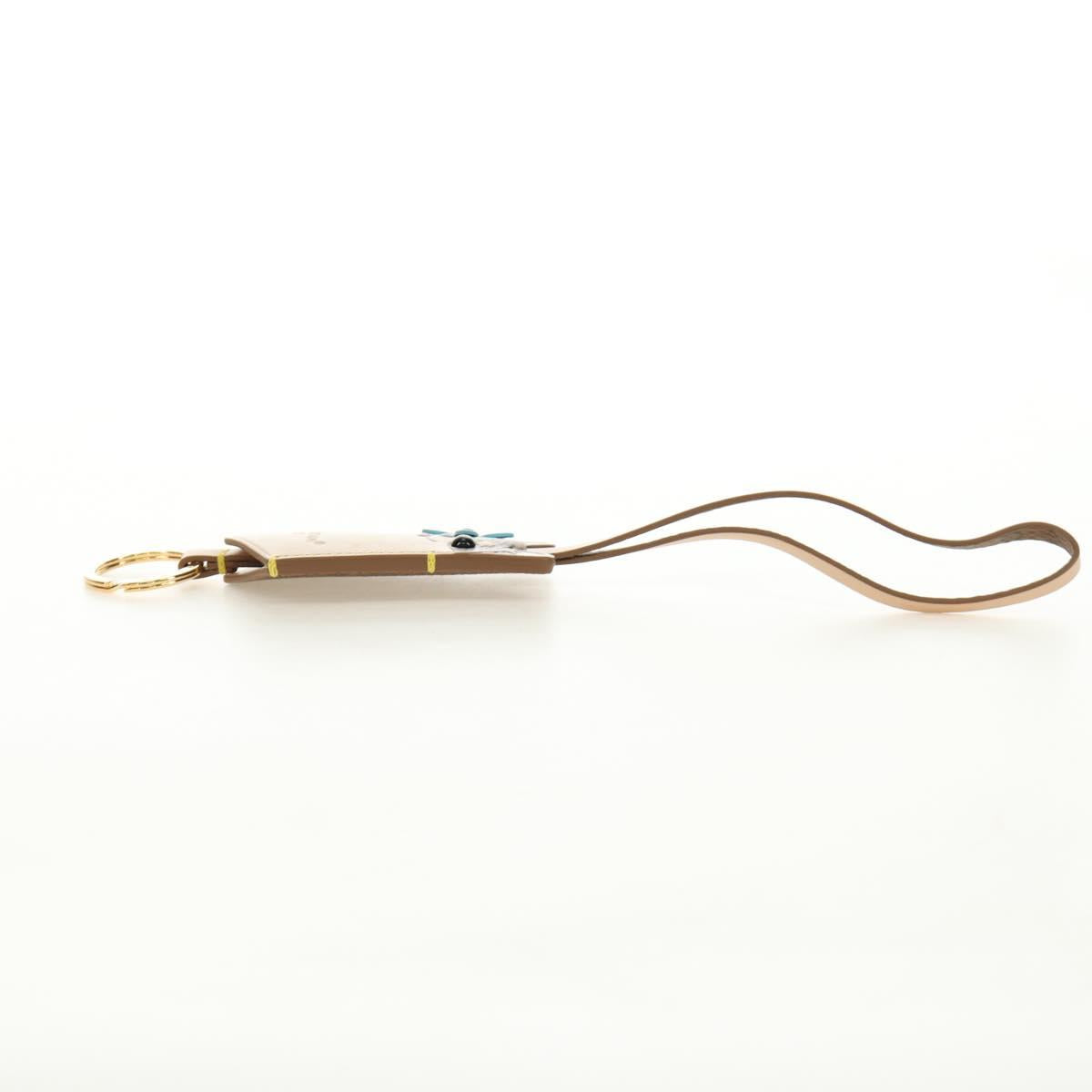 LOUIS VUITTON Monogram Reverse Bag Charm LV Dog Bag Charm M02323 LV Auth 188734M