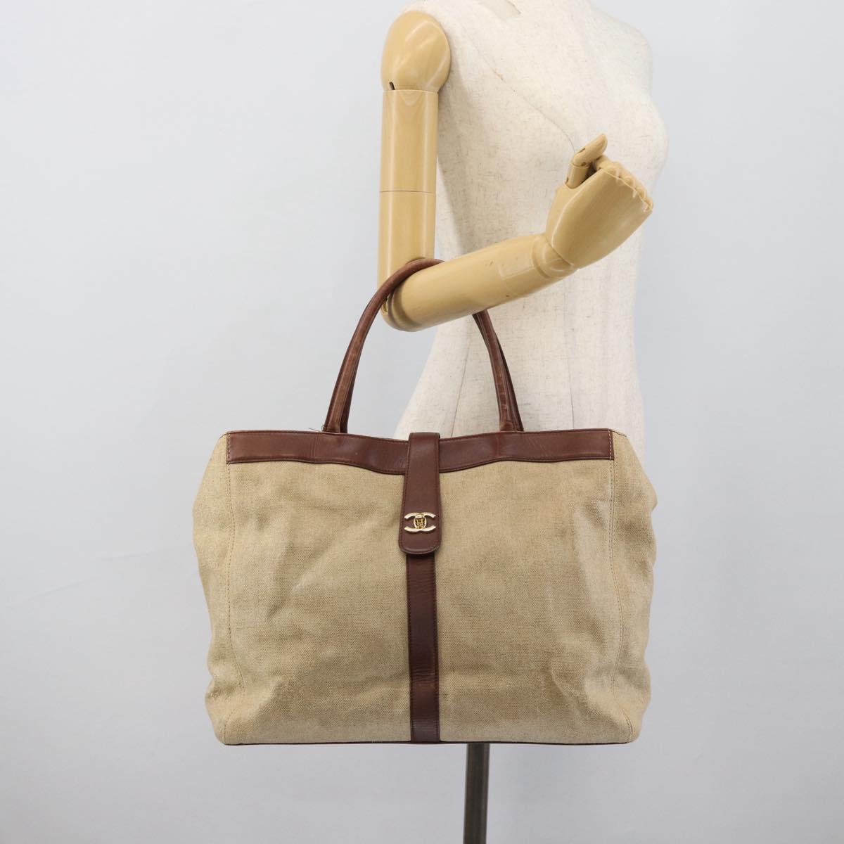 CHANEL Tote Bag Coated Canvas Beige Gold CC Auth 192678