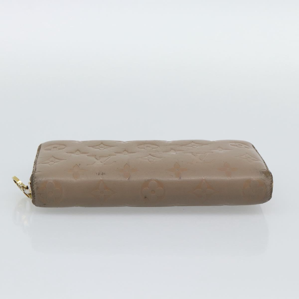 LOUIS VUITTON Monogram Emboss Zippy Wallet Long Wallet Beige M81511 Auth 192854