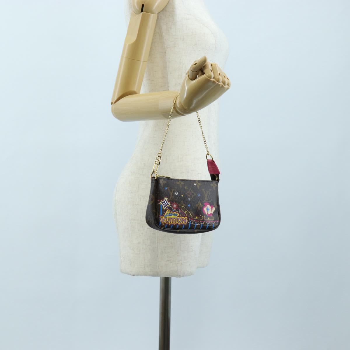 LOUIS VUITTON Monogram Vivienne Mini Pochette Accessoires M69752 LV Auth 195027M