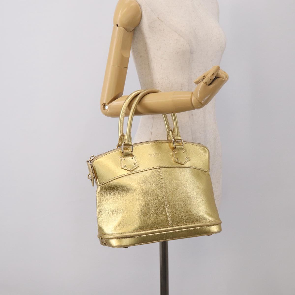 LOUIS VUITTON Suhari Lockit Hand Bag Leather Gold M95433 LV Auth 211489A