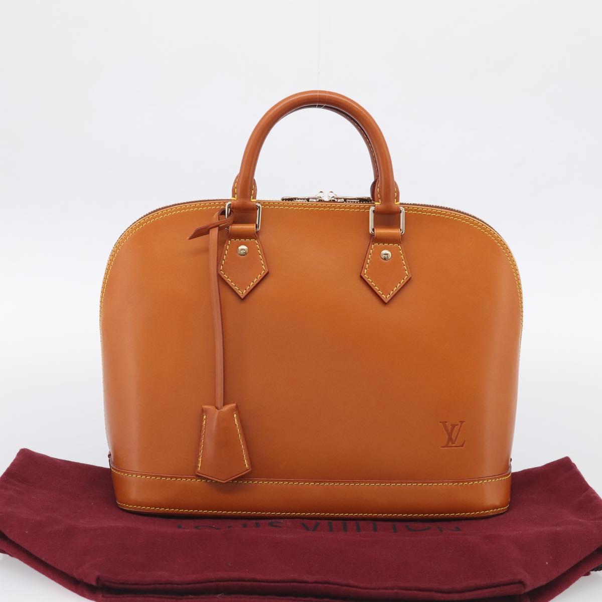 LOUIS VUITTON Nomad leather Alma Hand Bag Beige M85000 LV Auth 211758V