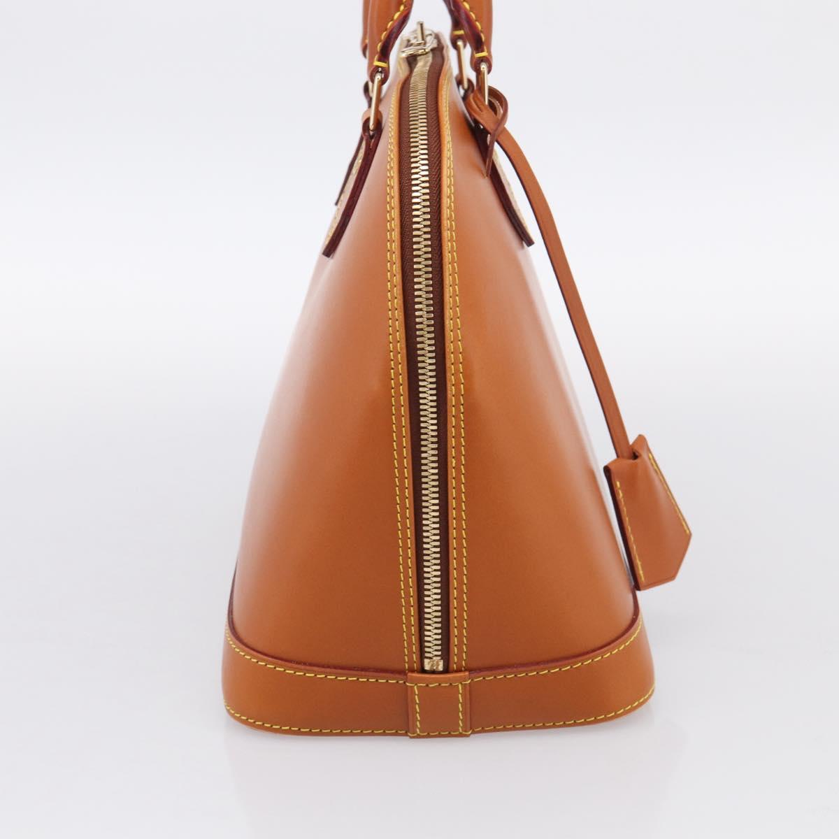 LOUIS VUITTON Nomad leather Alma Hand Bag Beige M85000 LV Auth 211758V
