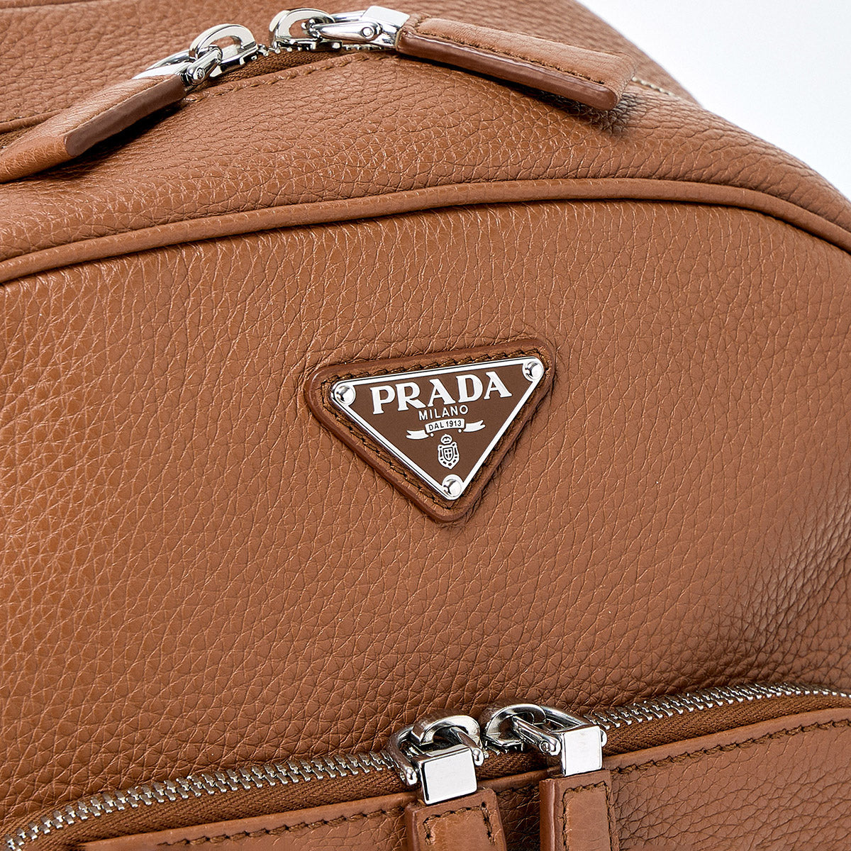 PRADA Triangle Backpack in Brown and Silver Leather