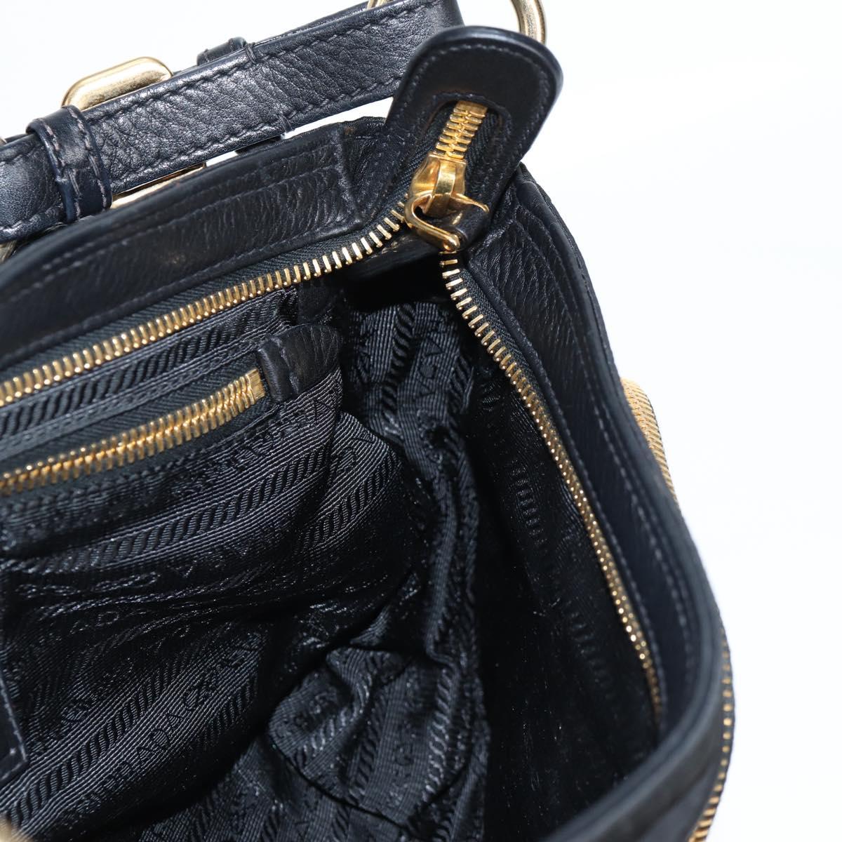 PRADA logo shoulder bag in black and gold leather