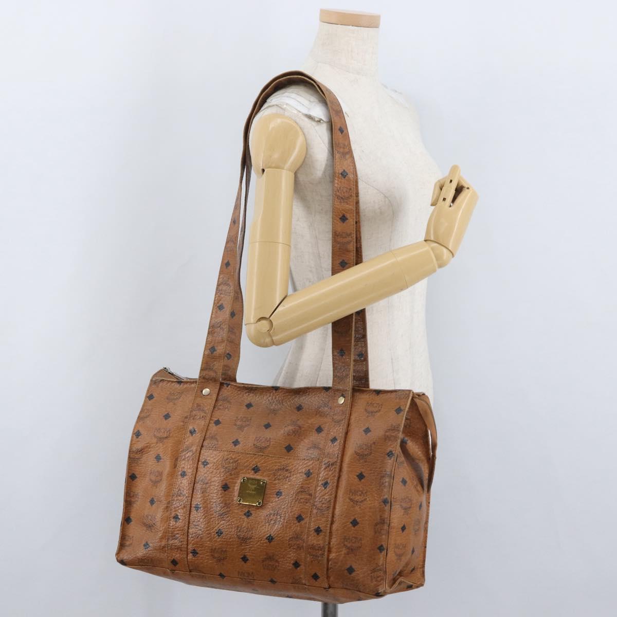MCM Logogram Vicetos Tote Bag PVC Brown Gold Auth BA10940