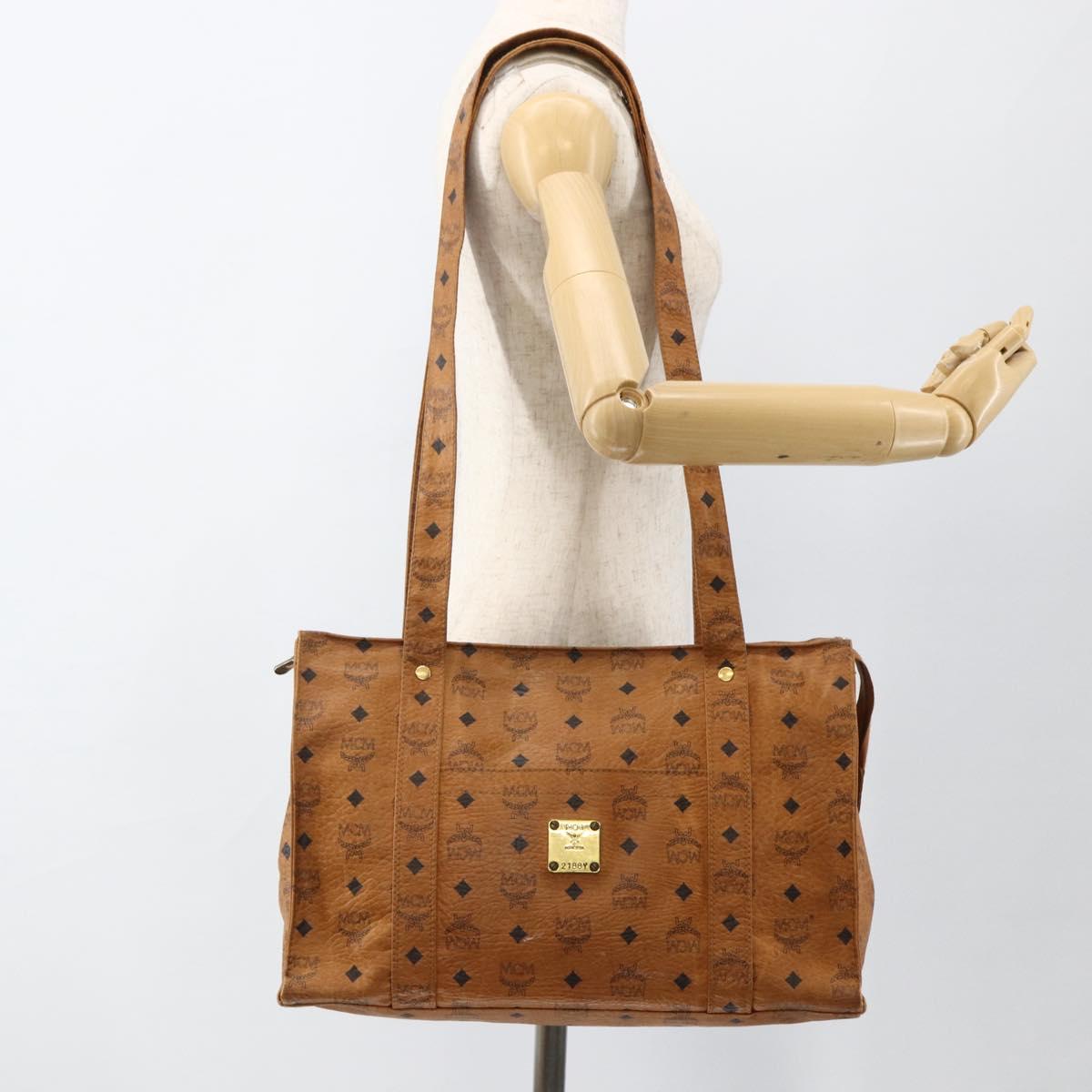 MCM Logogram Vicetos Tote Bag PVC Brown Gold Auth BA11113