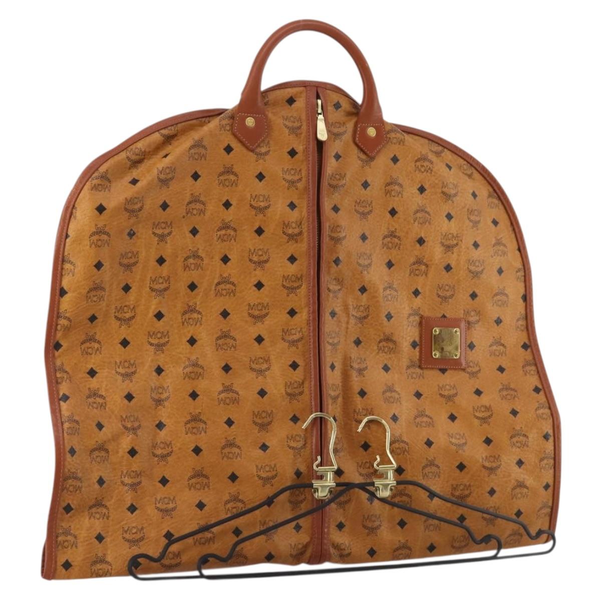 MCM Vicetos Logogram Garment Cover Leather Brown Gold Auth BA13677V