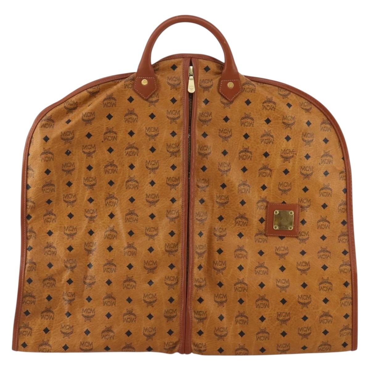 MCM Vicetos Logogram Garment Cover Leather Brown Gold Auth BA13677V