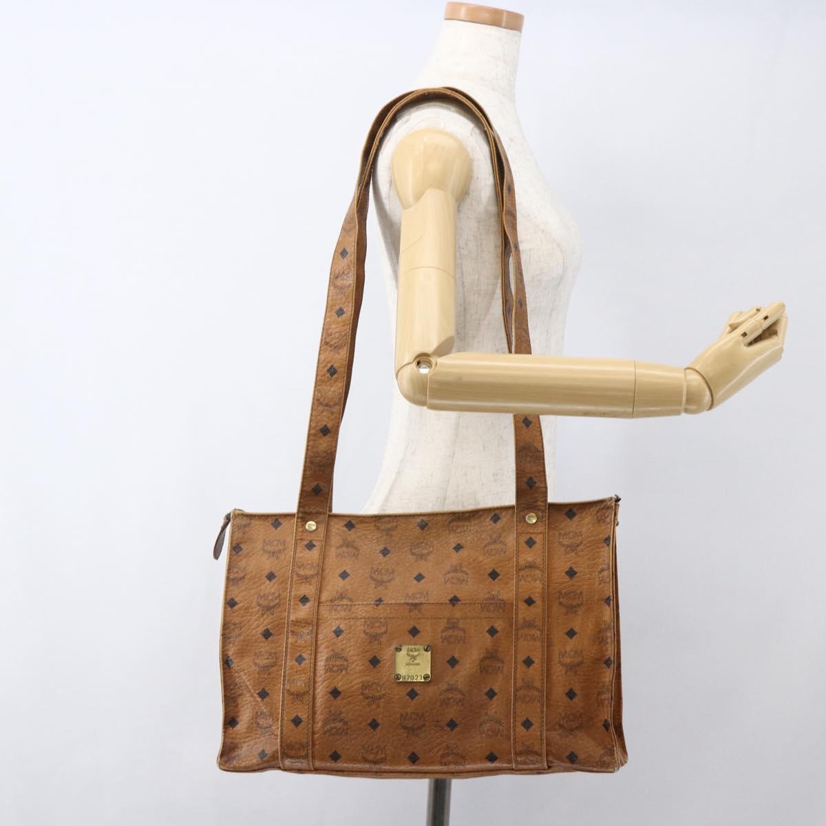 MCM Logogram Vicetos Tote Bag PVC Brown Gold Auth BA9161
