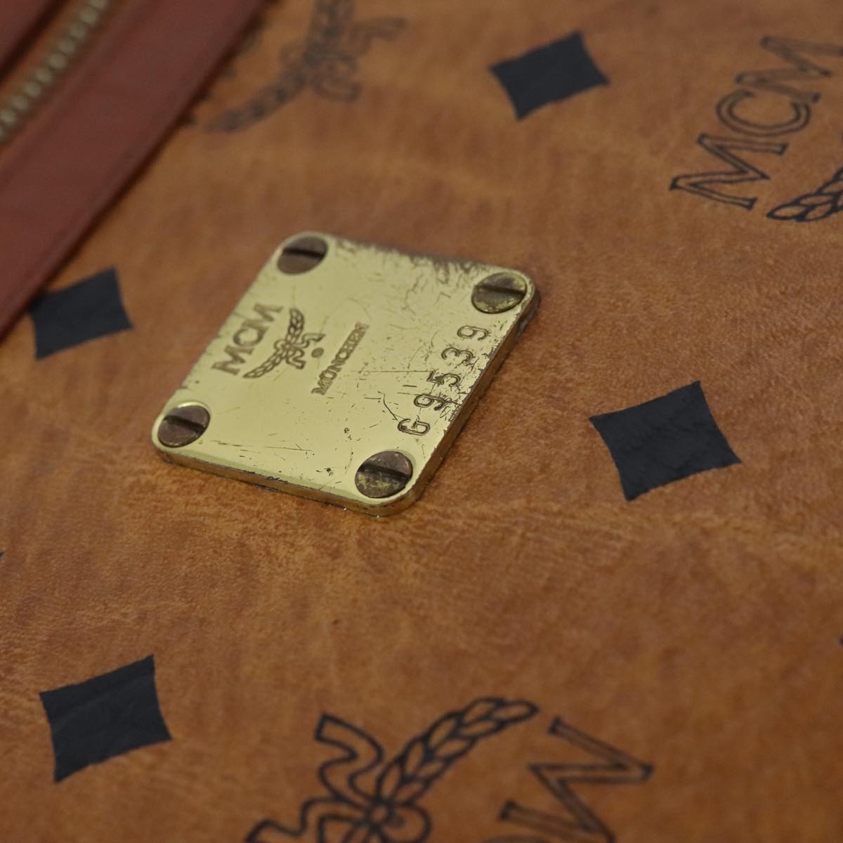 MCM Vicetos Logogram Clutch Bag PVC Leather Brown Gold Auth bs21066