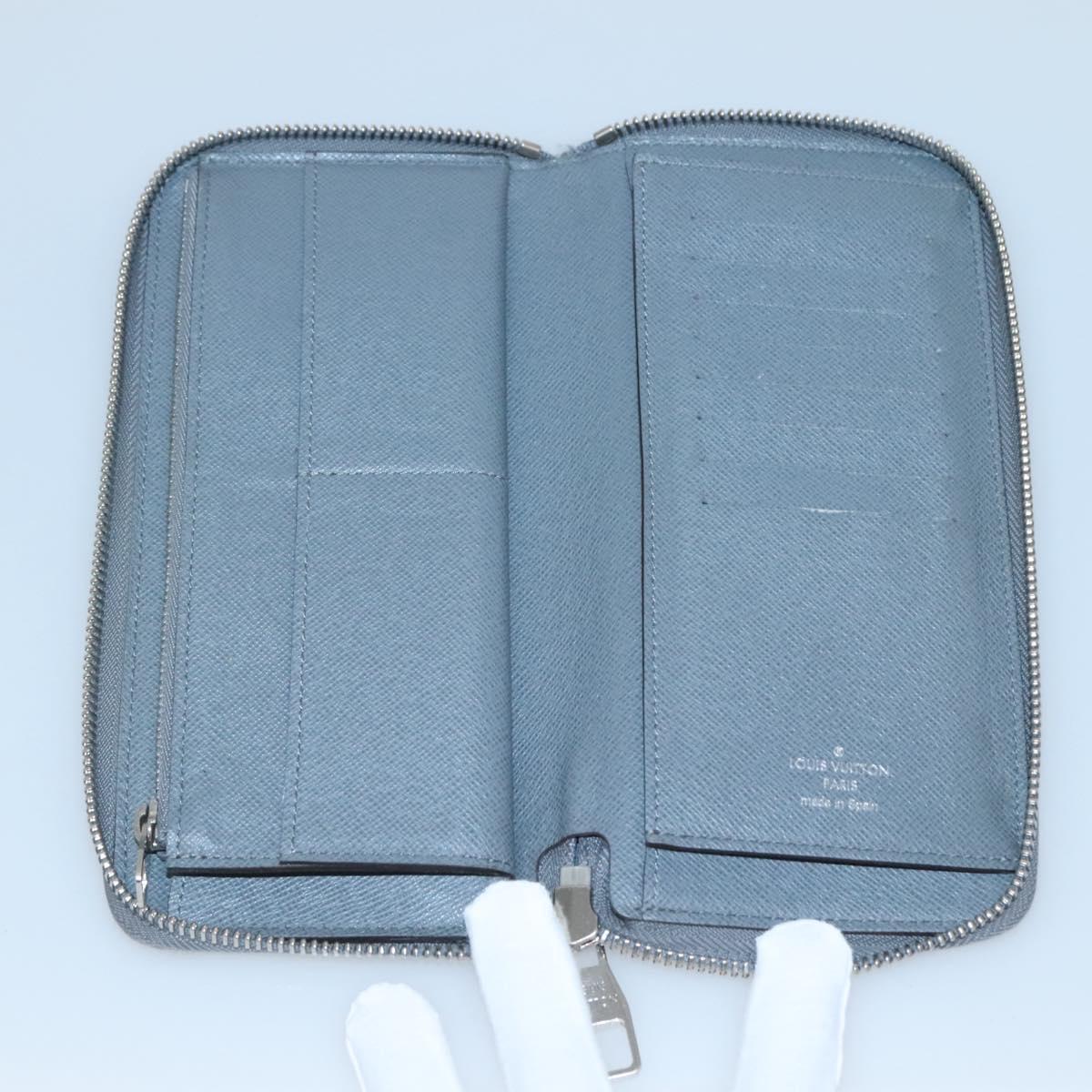 LOUIS VUITTON Taiga Zippy Wallet Vertical Gray Gracie M32601 LV Auth bs25700