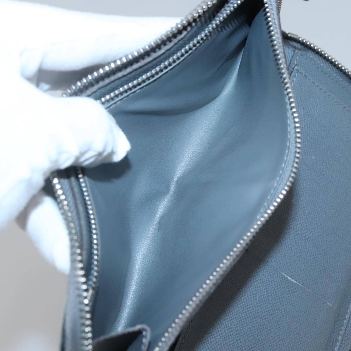 LOUIS VUITTON Taiga Zippy Wallet Vertical Gray Gracie M32601 LV Auth bs25700