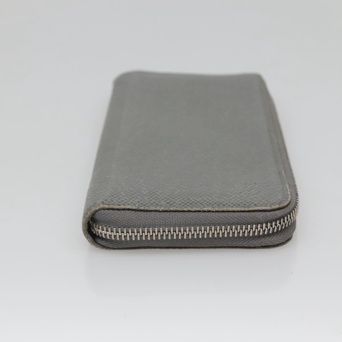 LOUIS VUITTON Taiga Zippy Wallet Vertical Gray Gracie M32601 LV Auth bs25700