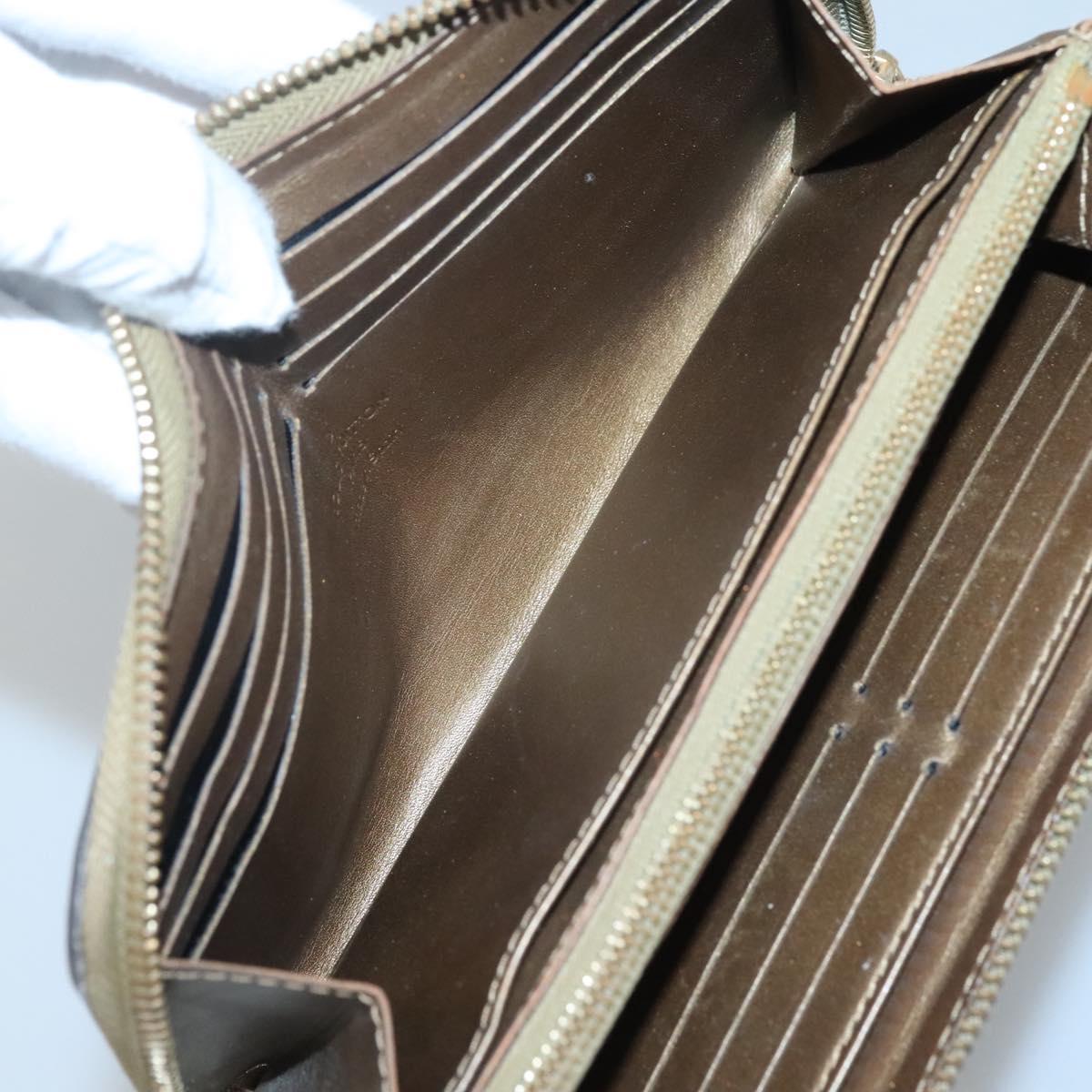 LOUIS VUITTON Suhari Zippy Wallet Leather Bronze M95701 LV Auth fm4650